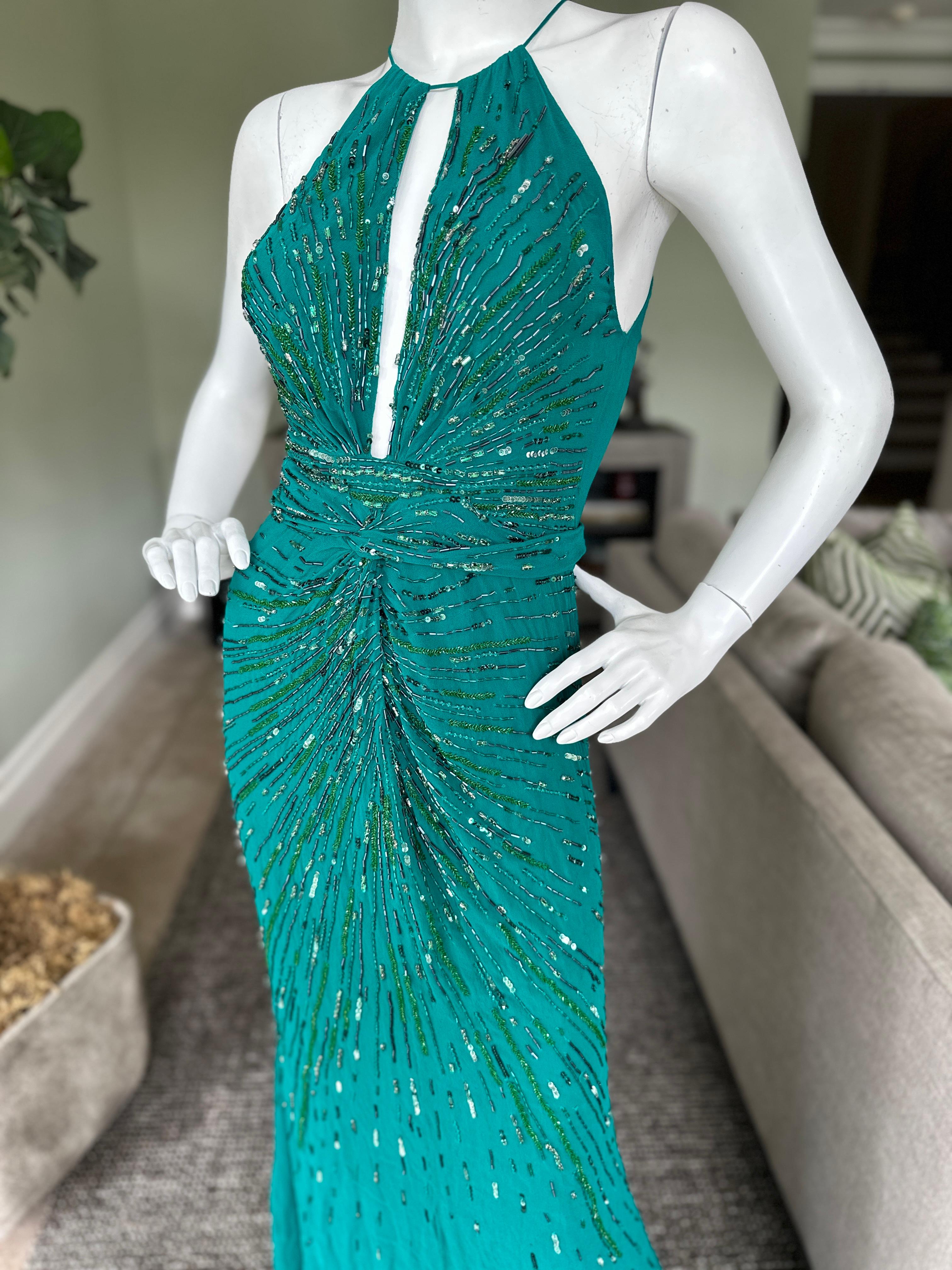 Roberto Cavalli Vintage Beaded Plunging Green Evening Dress with Fishtail Back
Simply sensational, there is a  silk belt attached
 Size 40
 Bust 34