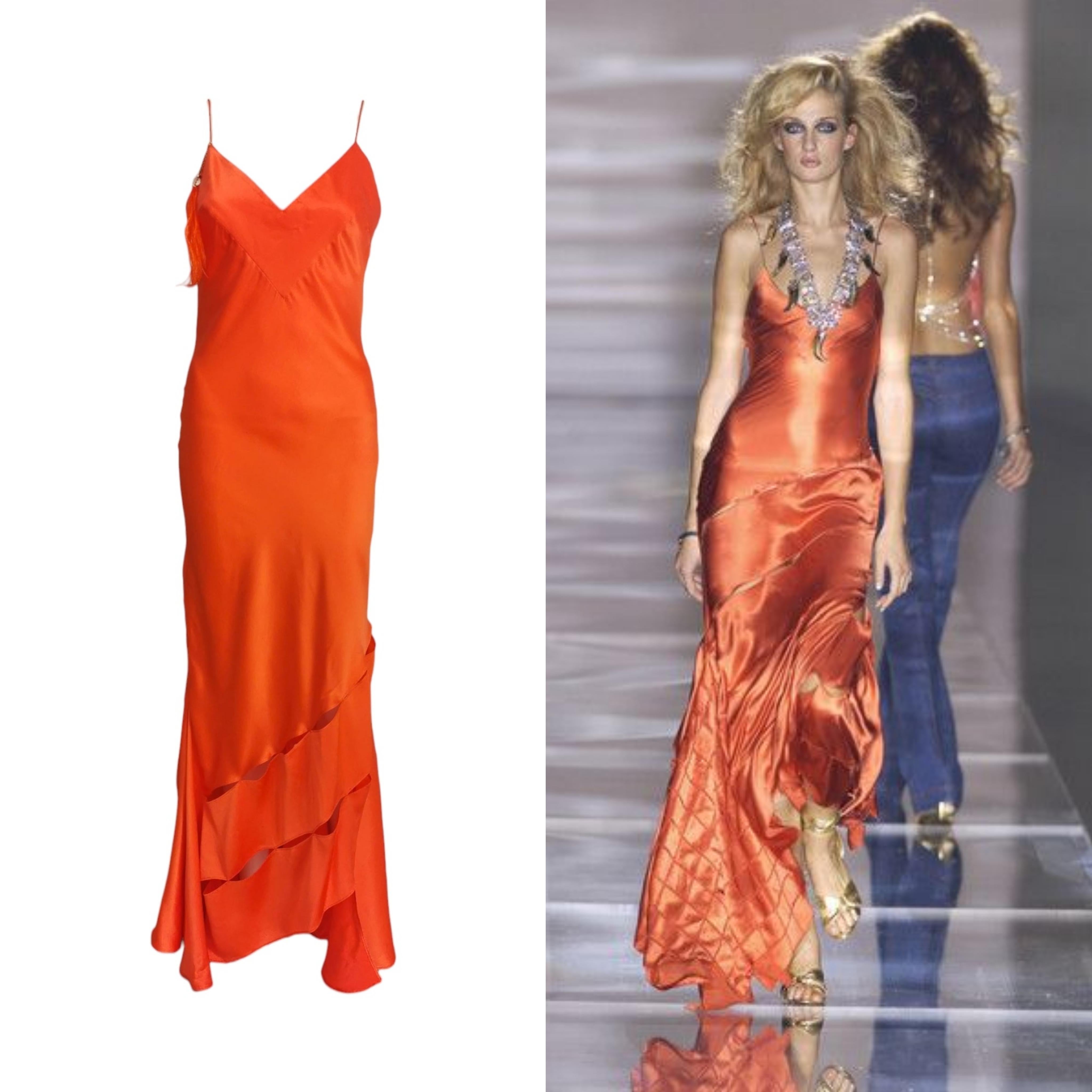 Roberto Cavalli bias cut gown from the SS 2004 collection. Features a feather charm.
Size: Medium 
Condition: Very Good
Material: Silk