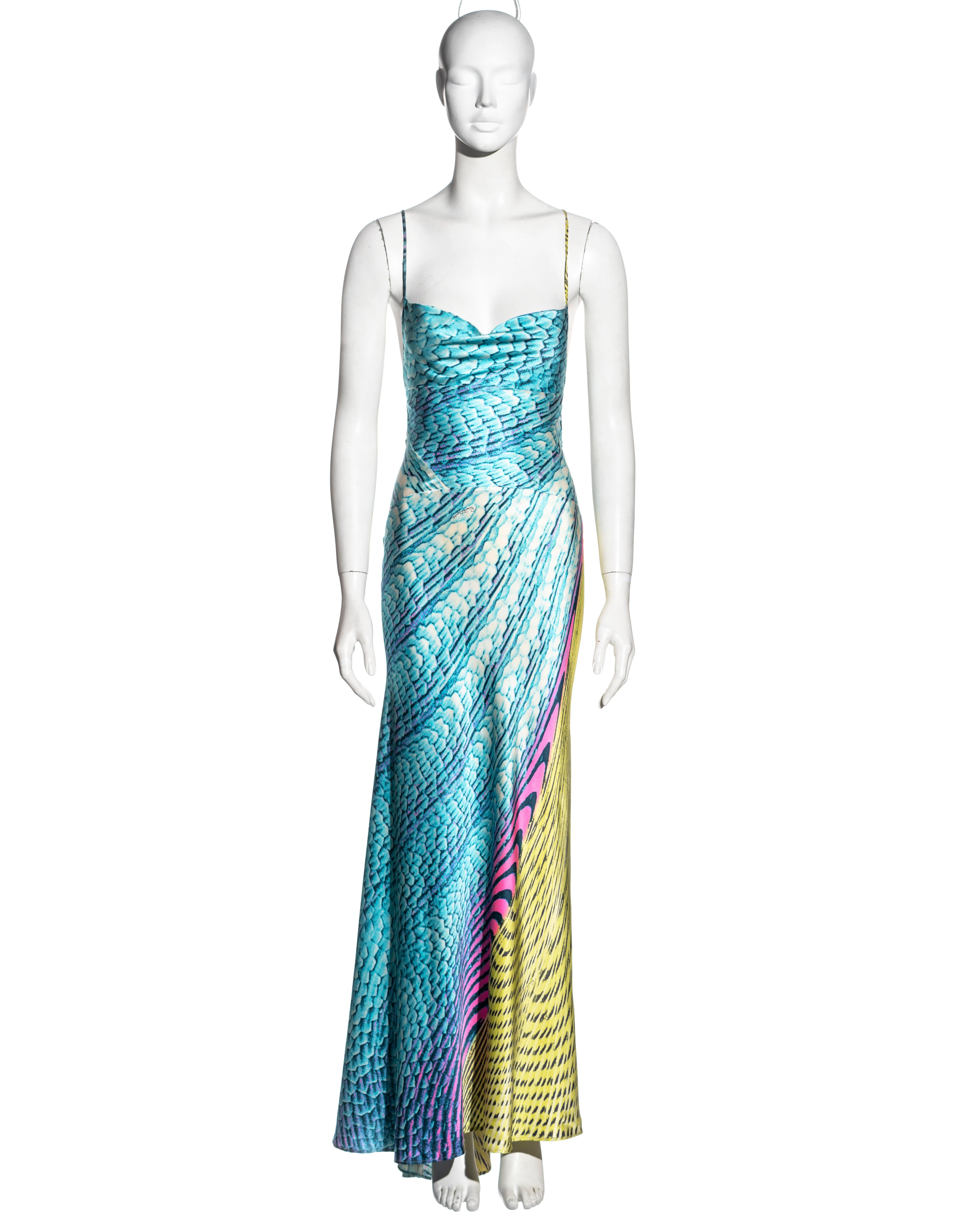 ▪ Roberto Cavalli silk evening dress
▪ Psychedelic print in vibrant blue, pink and chartreuse
▪ Bias cut 
▪ Cowl neck 
▪ Open low back 
▪ Asymmetric hemline 
▪ Size Extra Small
▪ Spring-Summer 2001
▪ 100% Silk
▪ Made in Italy