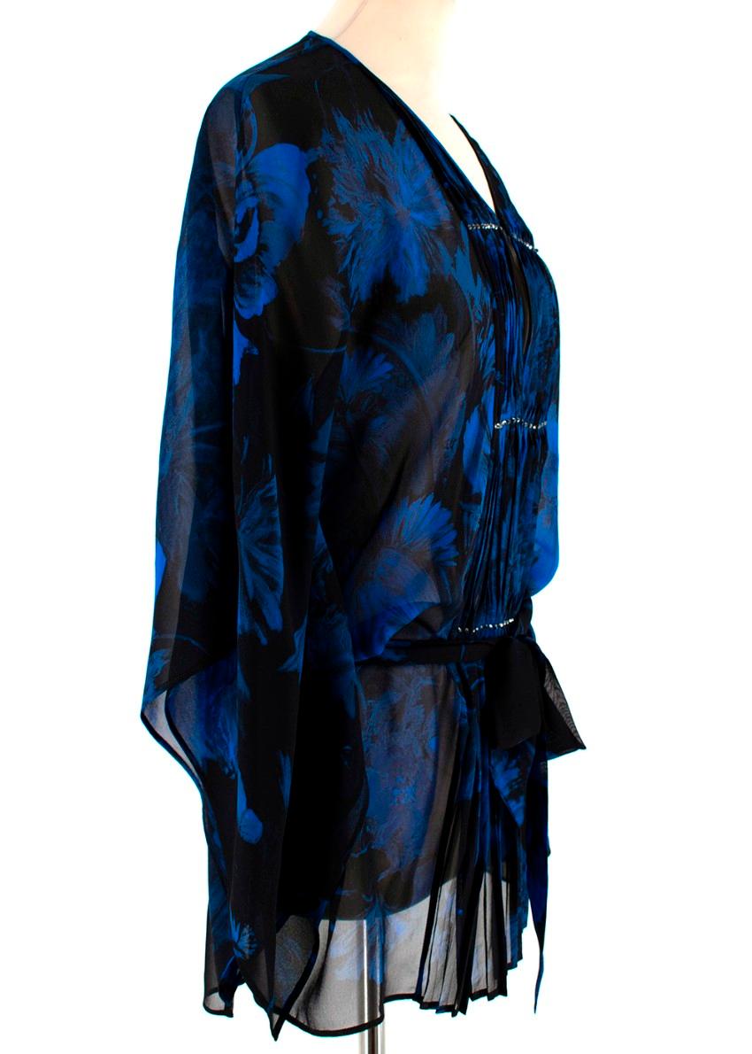 Roberto Cavalli Black & Blue Sheer Floral Pattern Top 

- V-neck 
- Pleated front detail
- Sequin embellishment 
- Button front fastening 
- Wide sleeves 
- Detachable belt 

Materials:
- Silk
Measurements are taken laying flat, seam to seam.
