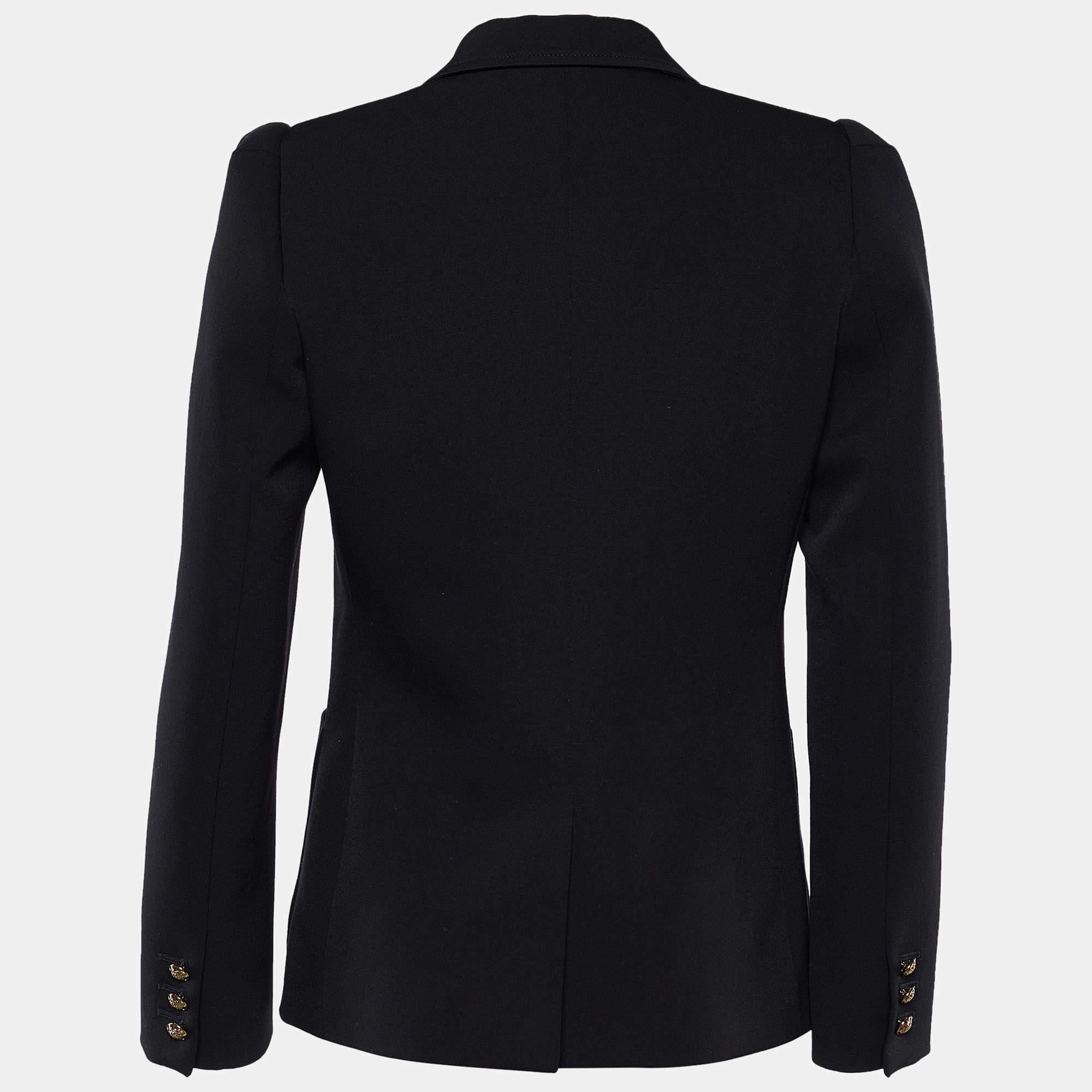 Make space in your closet for this uber-chic blazer from Roberto Cavalli. Created luxuriously from black cotton, the versatile piece has long sleeves and buttons at the front. External pockets along with a well-structured silhouette make it suitable