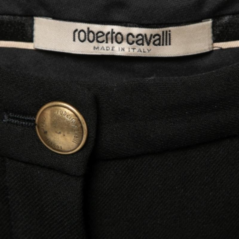 From Roberto Cavalli comes this pair of black trousers tailored to give you style with comfort! It has been tailored to a skinny fit and designed with front button fastening. Pair the trousers with any top of your choice and high heels.