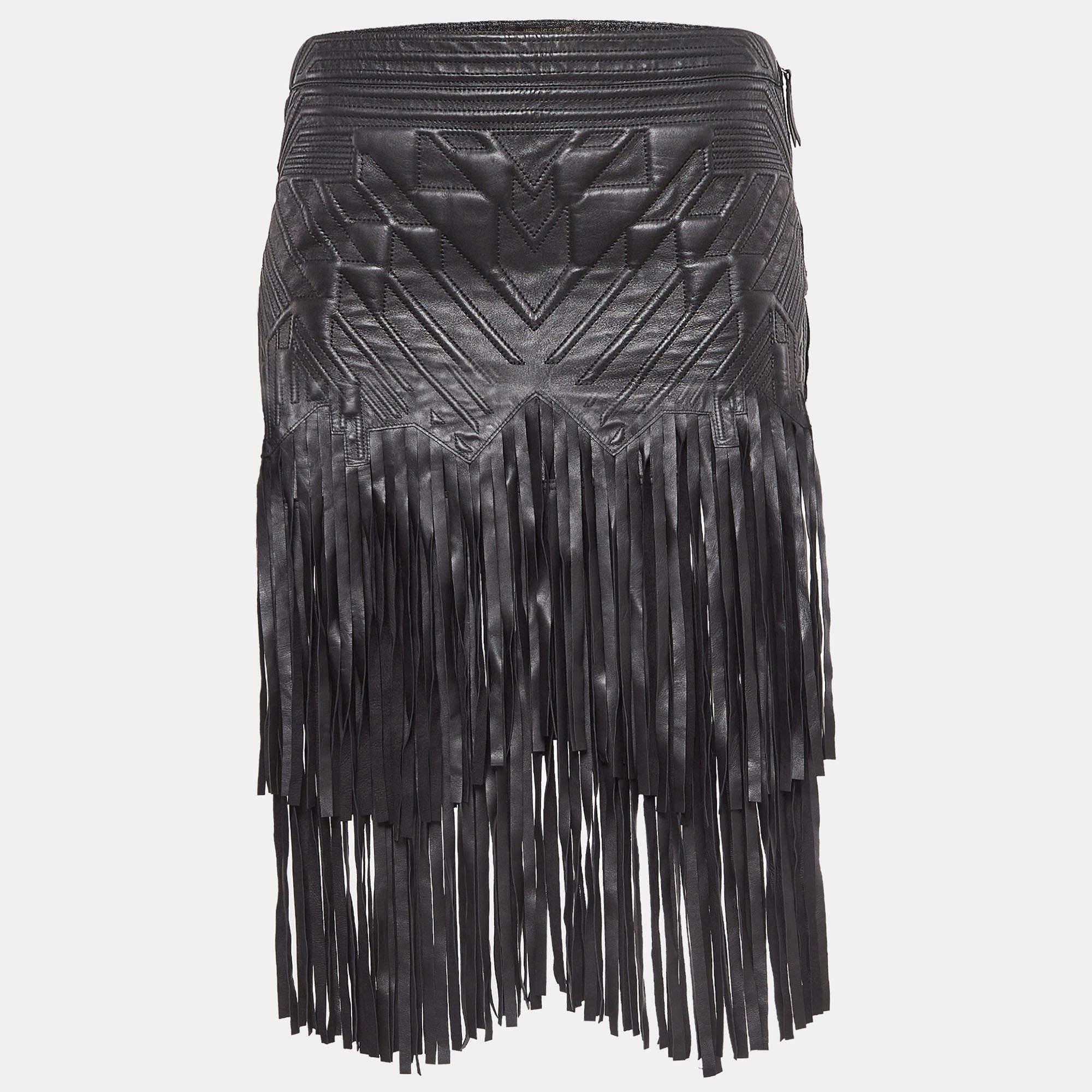 Elevate your wardrobe with this Roberto Cavalli leather skirt. It is beautifully tailored and detailed with embossing, zip closure, and fringes that sway with your every move.

