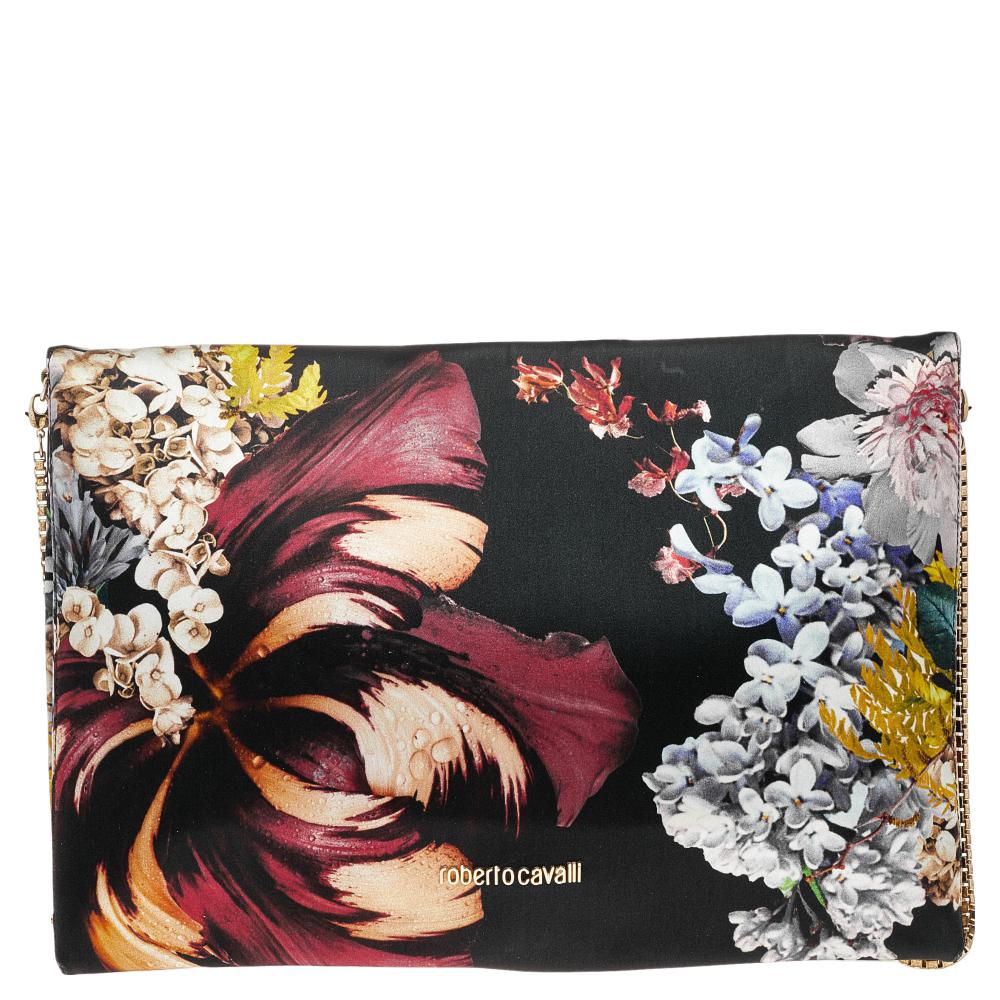 From the house of Roberto Cavalli, this bag is an outstanding fusion of elegance and style. Made in printed satin, it is styled with a full front flap and held by a shoulder strap. It is complete with a leather interior.