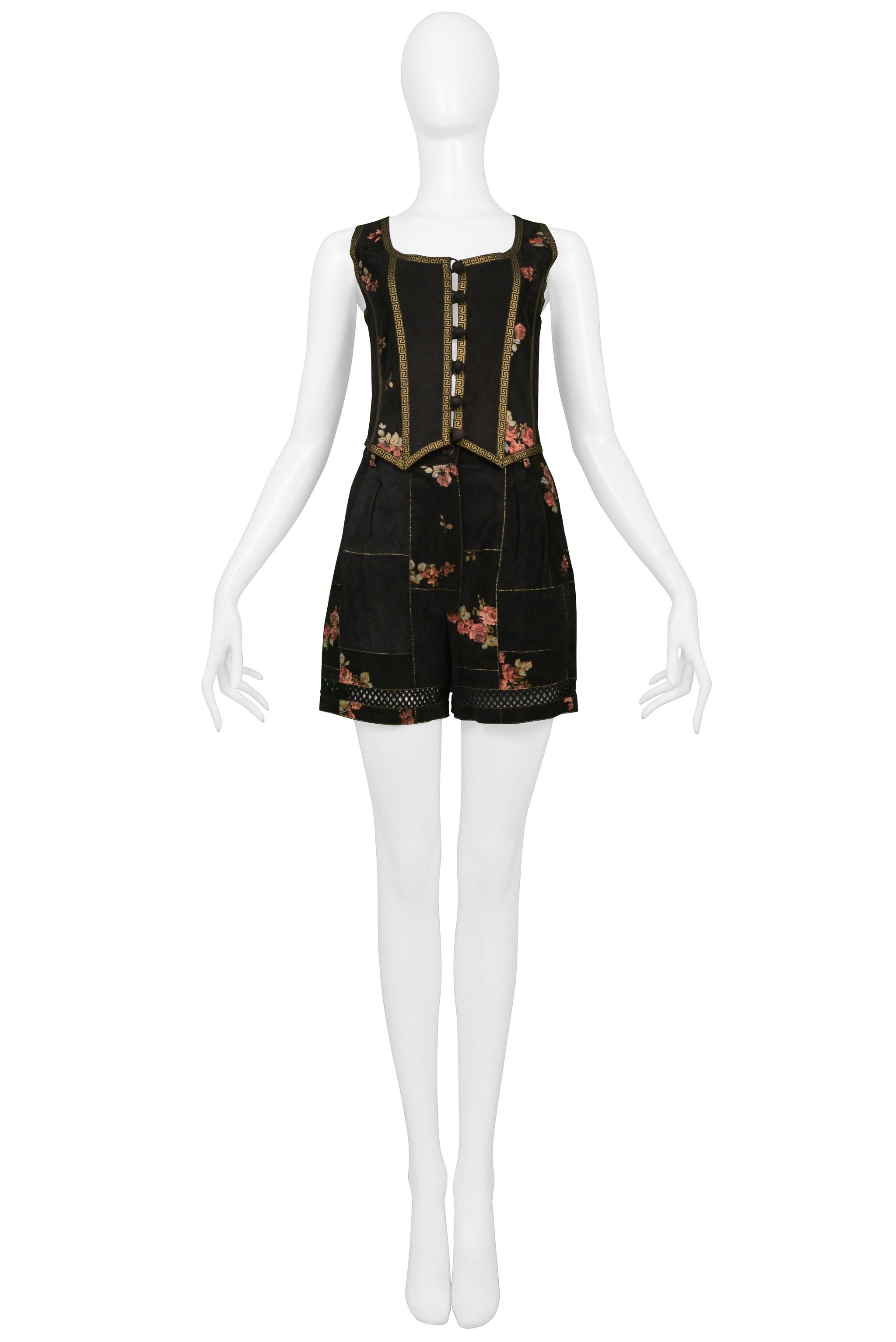 Resurrection Vintage is excited to present a vintage Roberto Cavalli black floral suede 2 piece set featuring a button top and shorts with gold trim detailing, floral pattern, and lattice cut out detailing. 

Roberto Cavalli
Size: S
Suede 
Excellent