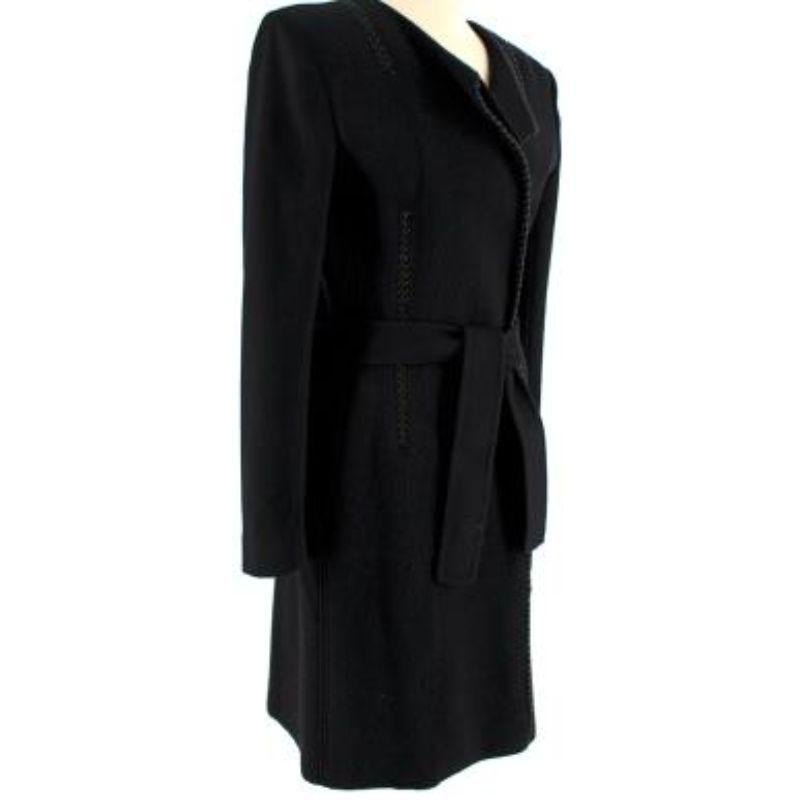 Roberto Cavalli Black knotted rope coat

-Leather trims 
-Concealed button fastening along the front 
-Buttoned cuffs 
-Shoulders pads
-Medium weight with no stretch 

Material: 

86%Wool 
7% Cashmere 

9.5/10 excellent conditions, please refer to