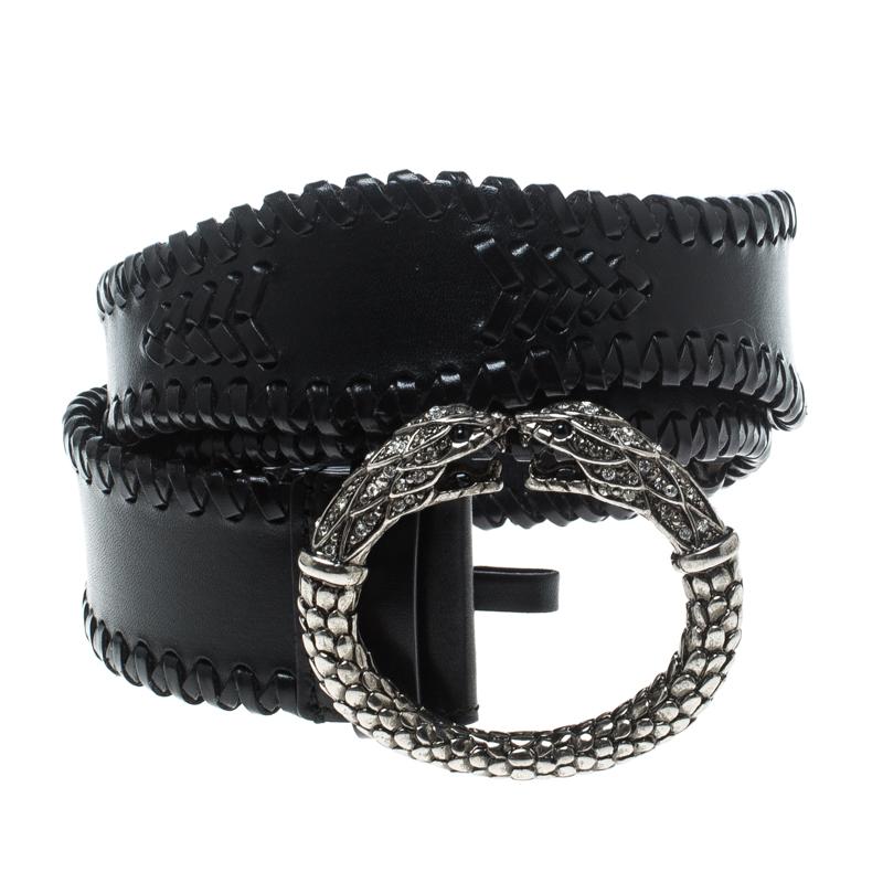 Accessorise right with this belt from Roberto Cavalli. It has been crafted in Italy from black leather and styled with braid details and a serpent buckle in silver tone. This piece can be worn with your casuals.

Includes: The Luxury Closet