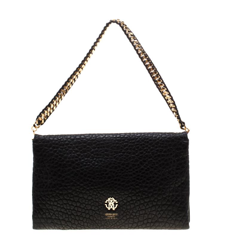Timeless in black, this Regina clutch bag from Roberto Cavalli is sure to add sparks of luxury to your closet! The clutch is crafted from textured leather and features a chic silhouette. It flaunts gold-tone stud embellishments on the front flap