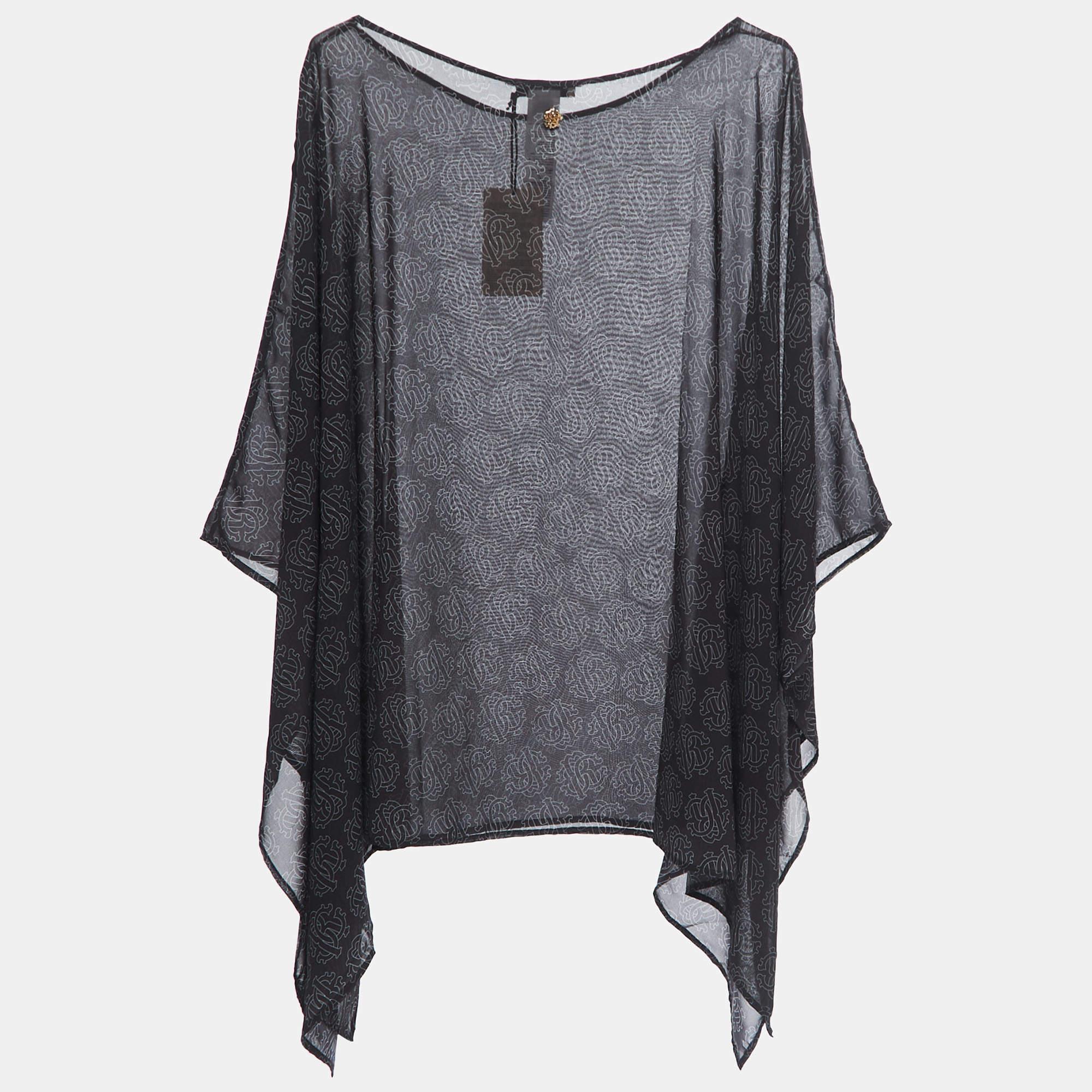 Crafted with exquisite attention to detail, it features a flowing kaftan silhouette in black, adorned with the iconic Roberto Cavalli logo print. This top effortlessly combines comfort and high-end style.

Includes: Price Tag