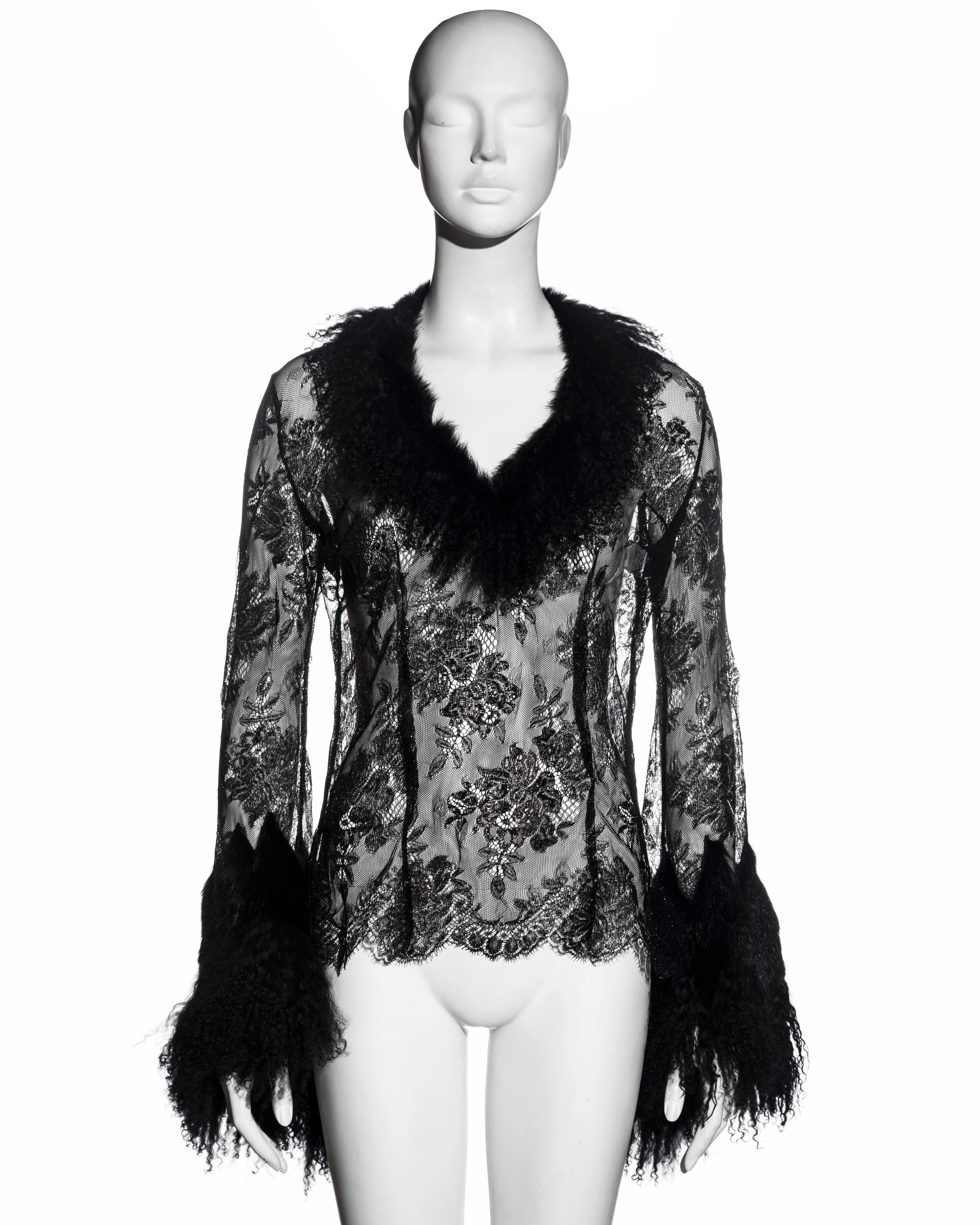▪ Roberto Cavalli black lace blouse 
▪ Collar and sleeves of black Mongolian lamb's fur 
▪ Black lace with metallic purple thread
▪ Bell sleeves 
▪ V-neck 
▪ Size Small
▪ Fall-Winter 1999