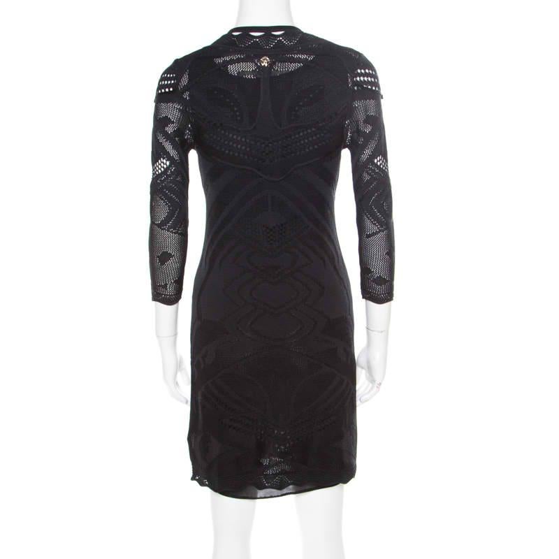 This bodycon dress from Roberto Cavalli is sure to help you stand out and make an impression like never before! The black creation is made of a viscose blend and features a perforated knit design. It flaunts a round neckline with a cut-out