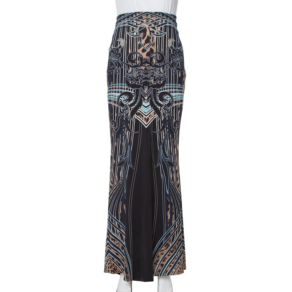 Gorgeous in detail and high on appeal, this maxi skirt is from the house of Roberto Cavalli. It is made from quality jersey fabric and designed in a fit and flare silhouette. This creation will look perfect with a simple top and slide sandals.

