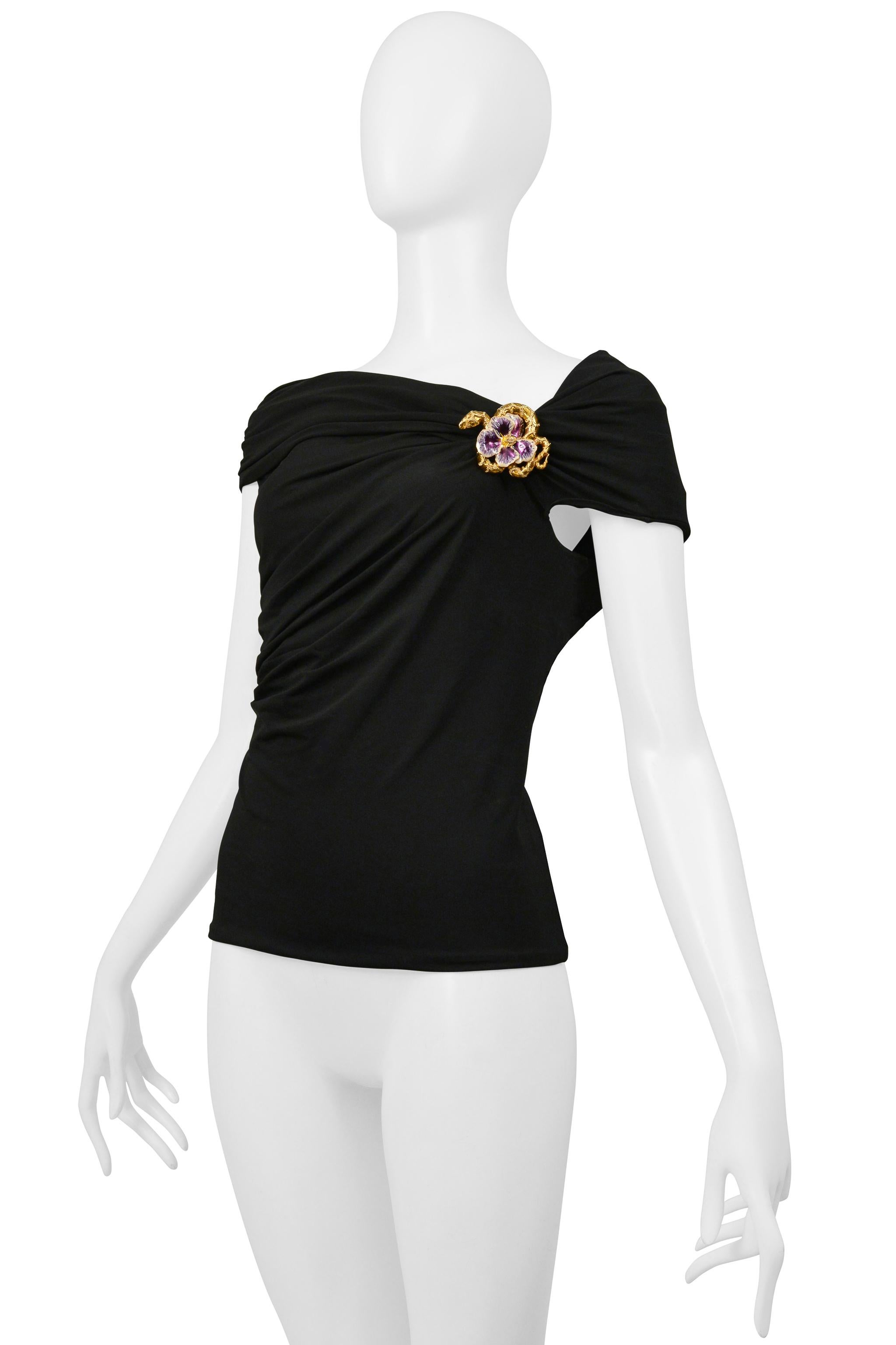 Resurrection Vintage is excited to present a vintage Roberto Cavalli black ruched top featuring a gold-tone metal snake and flower brooch, cold shoulder, side zipper, and center-back black ribbon detail.

* Roberto Cavalli
* Size: 44
* Fabric: 96%