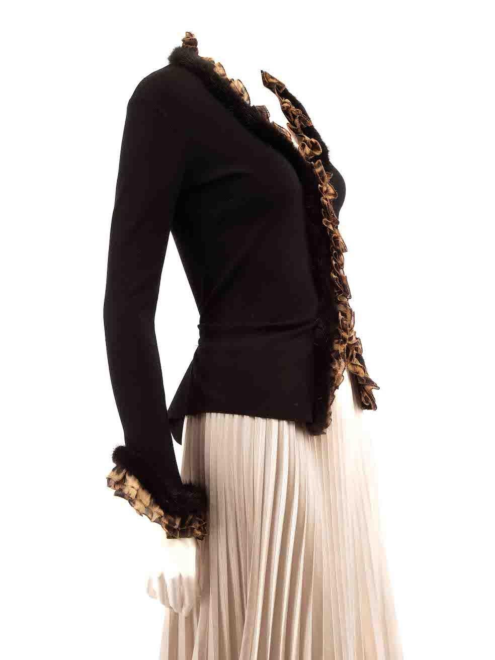 CONDITION is Very good. Minimal wear to jacket is evident. Light wear to sleeves with pulls to the weave on this used Roberto Cavalli designer resale item.
 
 
 
 Details
 
 
 Black
 
 Viscose
 
 Long sleeve cardigan
 
 Fine knitted and stretchy
 
