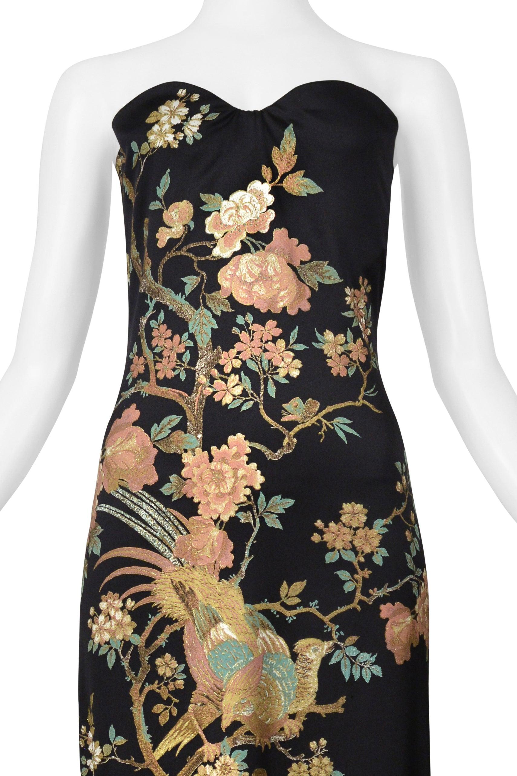 Resurrection Vintage is excited to offer a vintage strapless Roberto Cavalli gown featuring a multi-color oriental pattern with gold flecks, built-in bust corset, center back zipper with gold “Roberto Cavalli” hardware, and dramatic evening gown