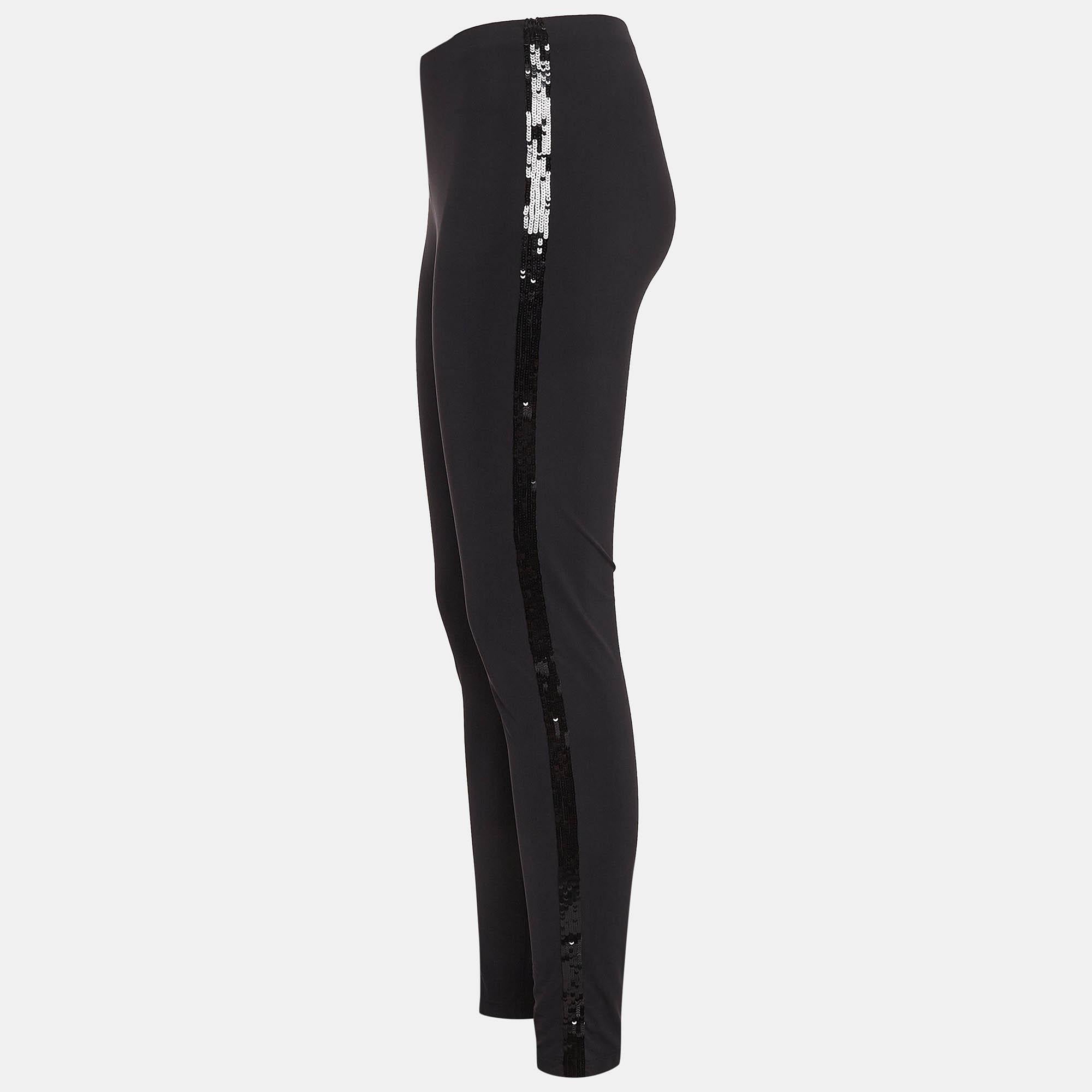 A more comfortable alternative to jeans or pants leggings are a closet must have. This Roberto Cavalli design is made from stretch knit fabric and cut to offer a great fit. The pair features sequins on the sides.