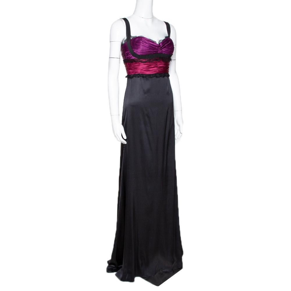 This maxi dress by Roberto Cavali is perfect for special occasions. It has been crafted from quality materials and comes in a classic shade of black. It has wide straps, a gathered bodice, lace trims, zip closure, a flattering silhouette and a