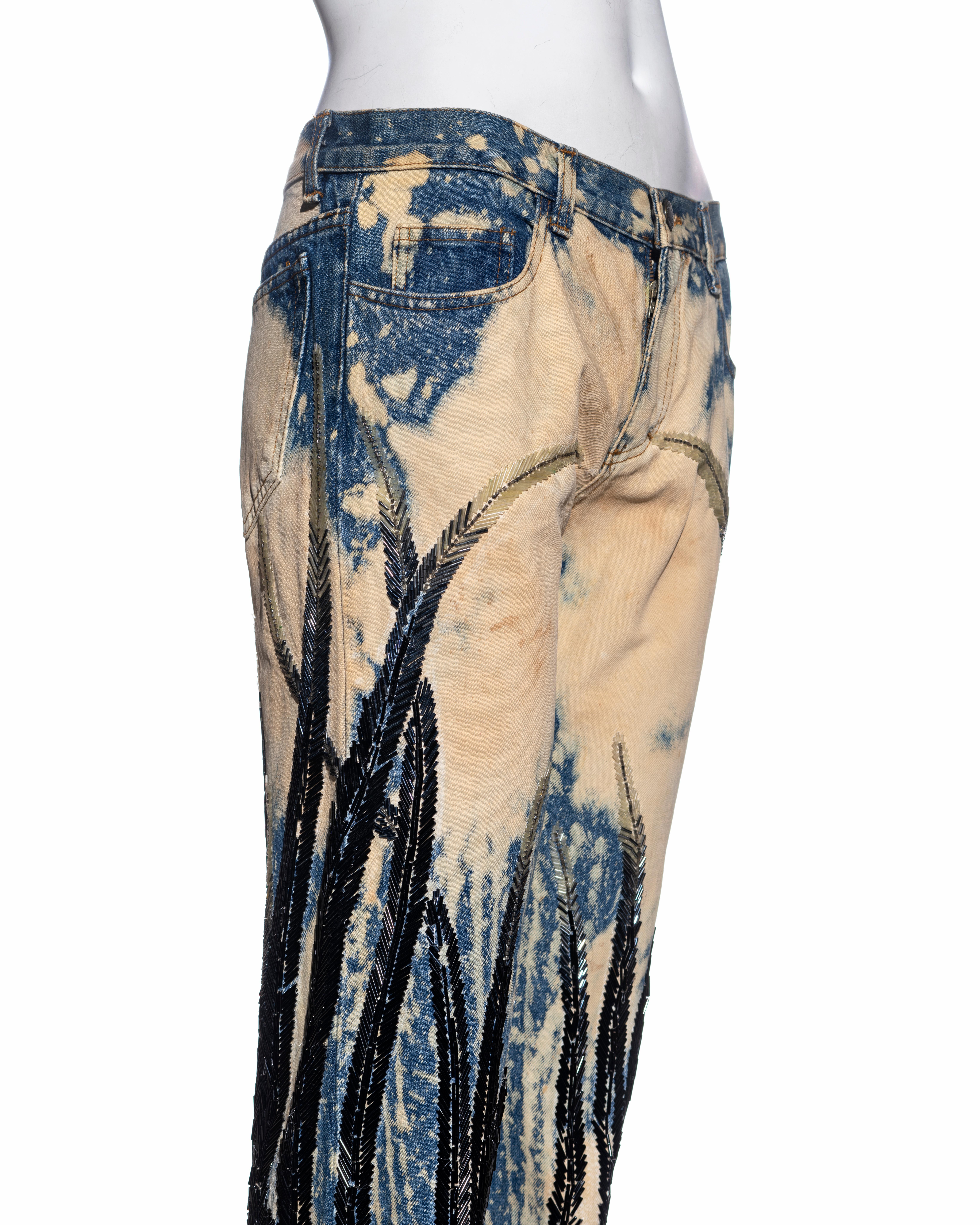 Black Roberto Cavalli bleached denim beaded jeans with feather embellishments, fw 2001