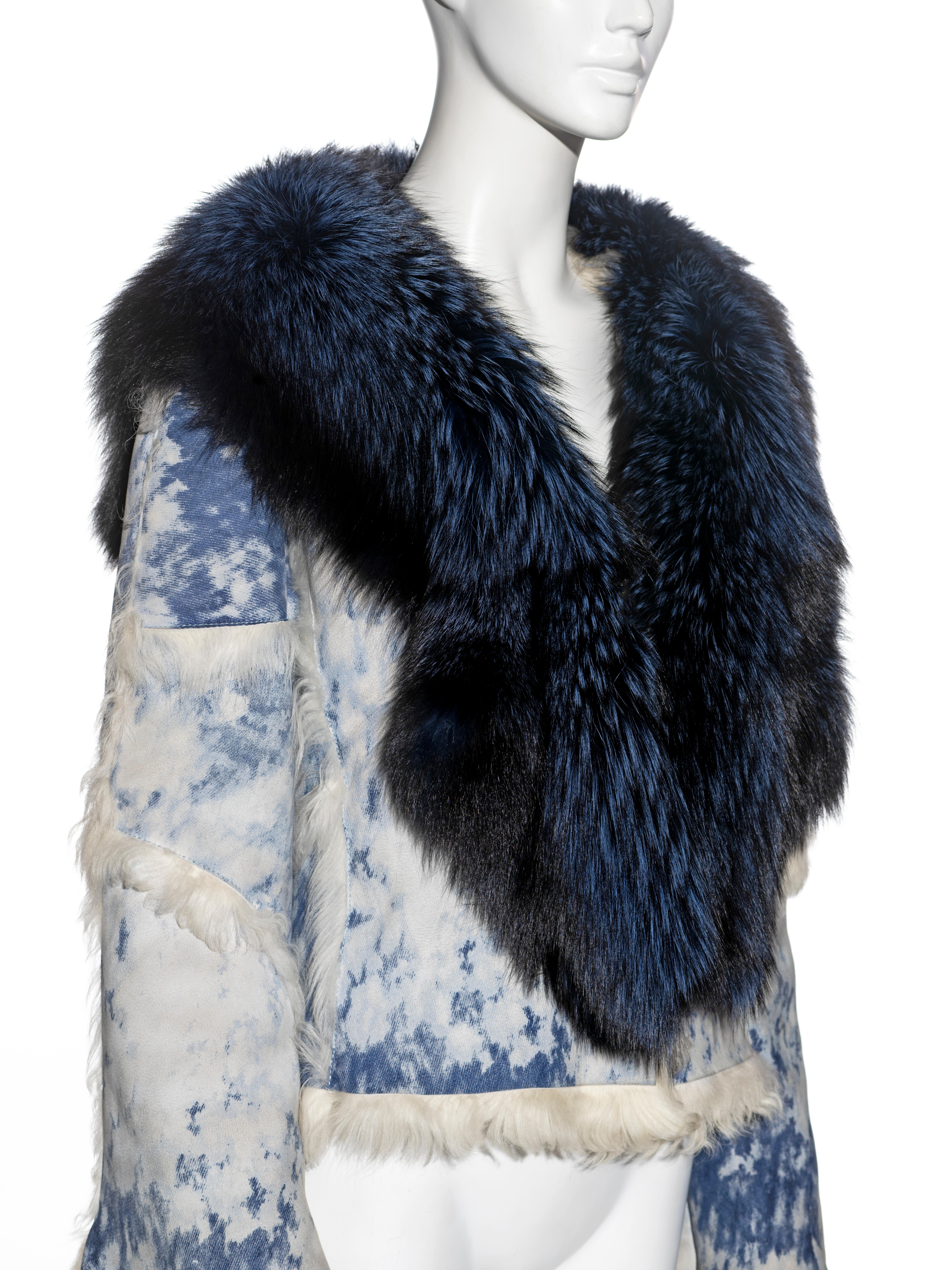 ▪ Roberto Cavalli jacket 
▪ Sold by One of a Kind Archive
▪ Constructed from leather with a bleached denim print 
▪ Large blue fox fur collar 
▪ White fur lining and trim 
▪ Size: Medium 
▪ Fall-Winter 2001
▪ Made in Italy

All photographs in this
