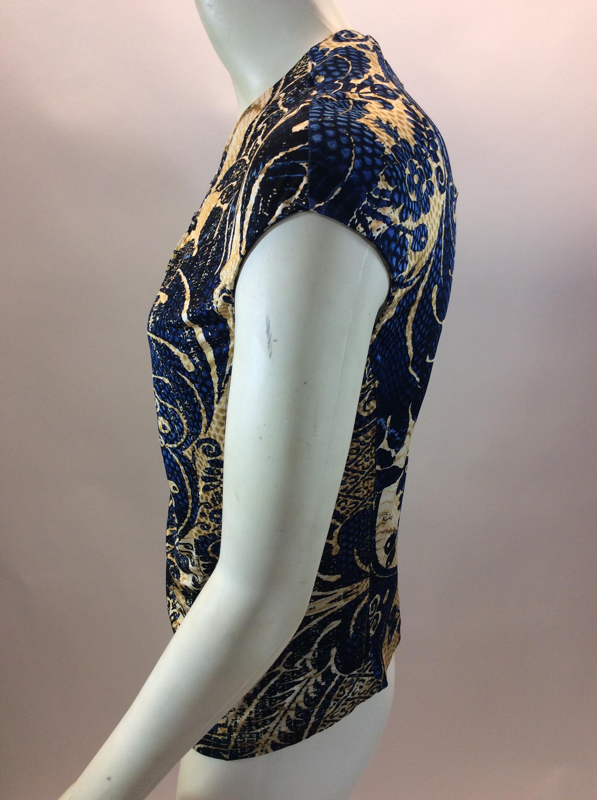 Roberto Cavalli Blue and Gold Print Blouse
$108
Made in Italy
6% Elastane, 94% Viscose
Size 42
Length 23