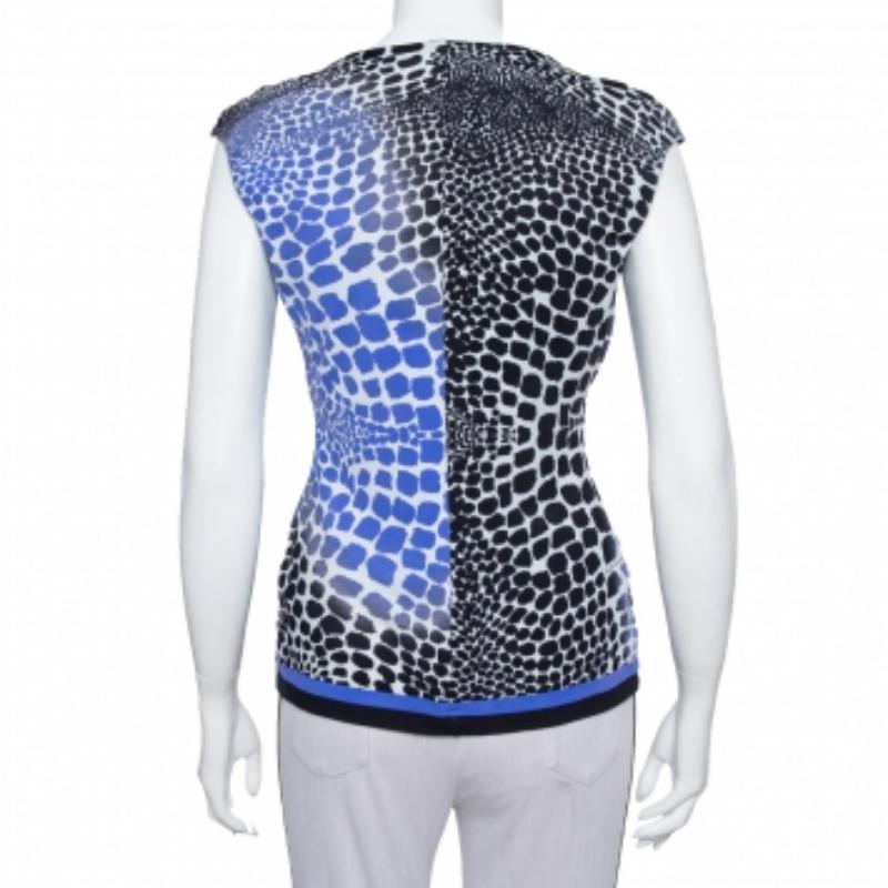 Animal prints are synonymous with Roberto Cavalli and this stylish top exhibits just that! This black and blue knit creation has been designed in a flattering silhouette with an animal print all over and styled with a plunging neckline and subtle