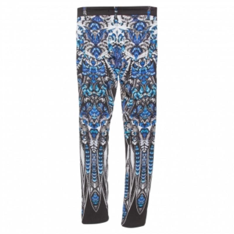 Constructed in blue cotton fabric, this pair of jeans is made special with a multicolored print all over the front and back creating the most eclectic style that can’t be missed. Completed with silver-tone hardware details, this pair is cut in a