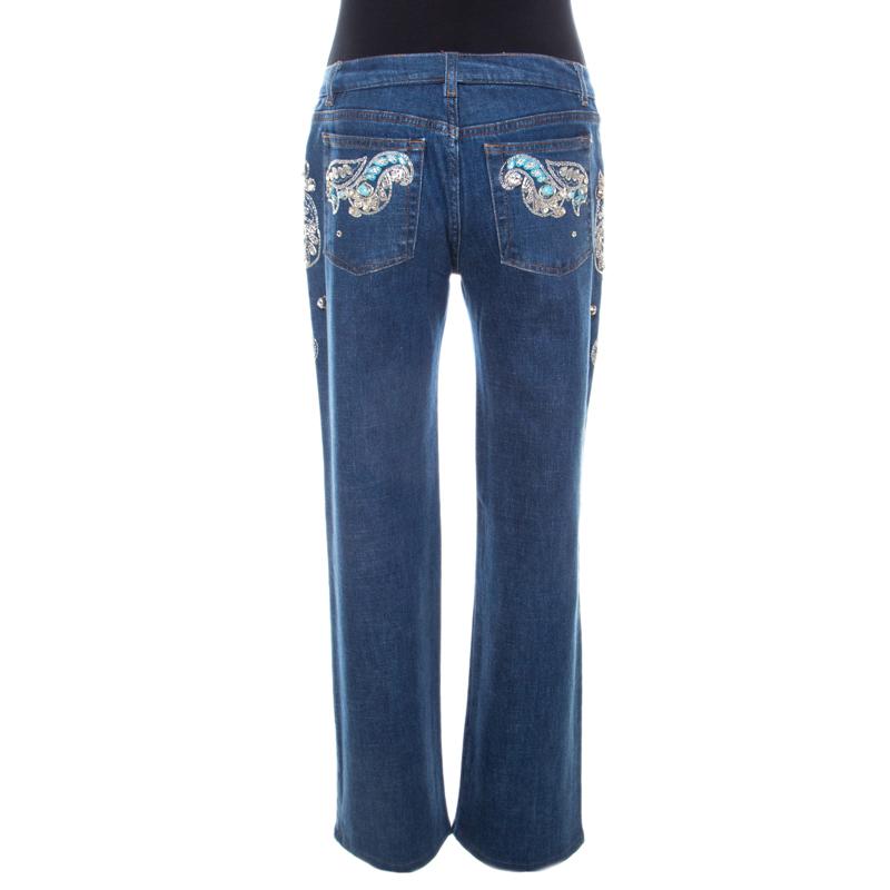 Wear these blue jeans from Roberto Cavalli on days when you wish to dress casually. Made of a cotton blend, they've been tailored in a wide leg shape and embellished with crystals. You must try wearing it with a halter top and block heel sandals.

