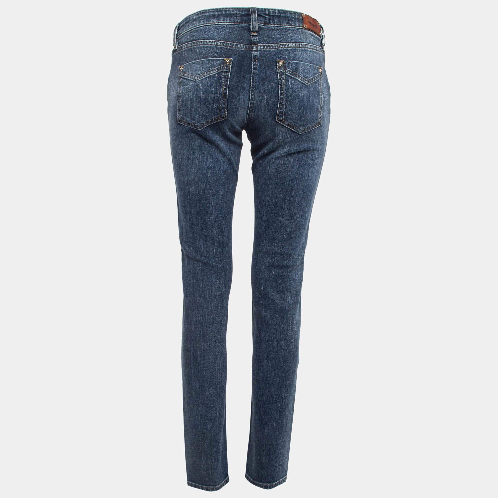 These Roberto Cavalli jeans are a must have wardrobe essential. These blue faded jeans can be dressed both up and down for looks that are either casual and comfy or chic and fashionable.