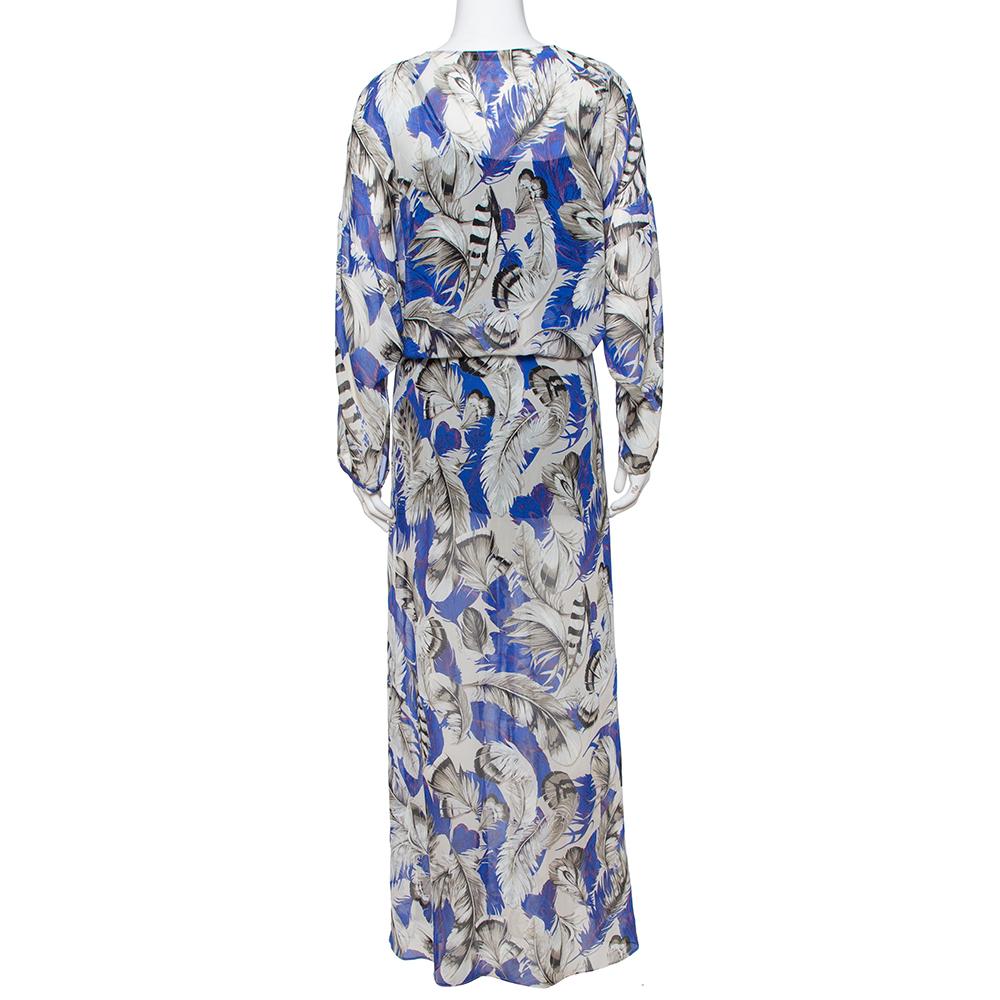This kaftan from Roberto Cavalli is a holiday staple; it is tailored with chiffon silk to a maxi length and can be carried in your luggage using minimum space. The kaftan has a blue feather print all over and a button fastening.

