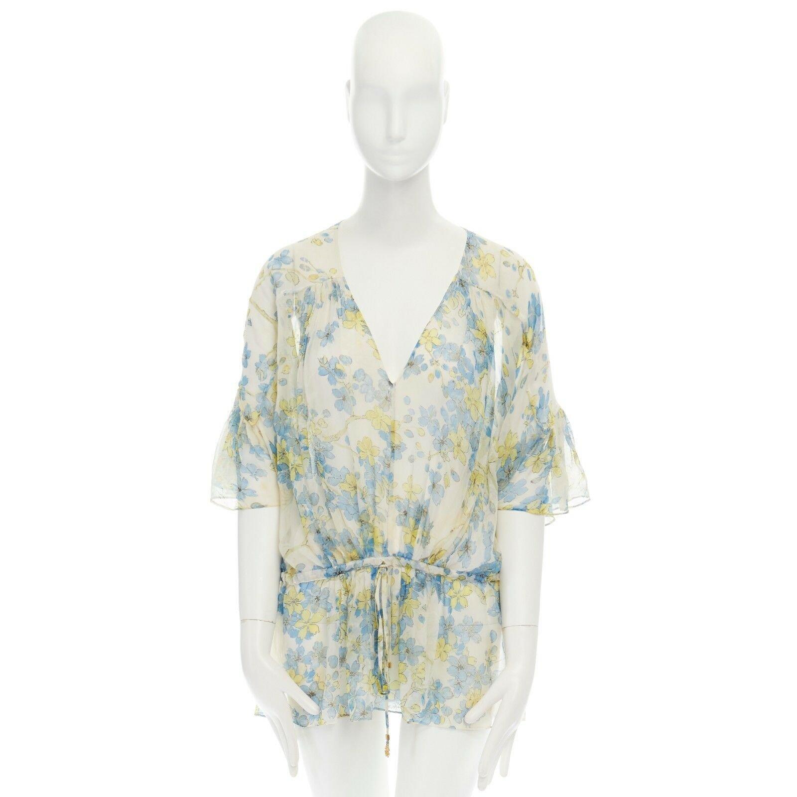 ROBERTO CAVALLI blue orange floral print silk semi sheer flutter sleeve top IT38 
Reference: MYSD/A00032 
Brand: Roberto Cavalli 
Designer: Roberto Cavalli 
Material: Silk 
Color: Blue 
Pattern: Floral 
Closure: Drawstring Extra Detail: 100% silk.