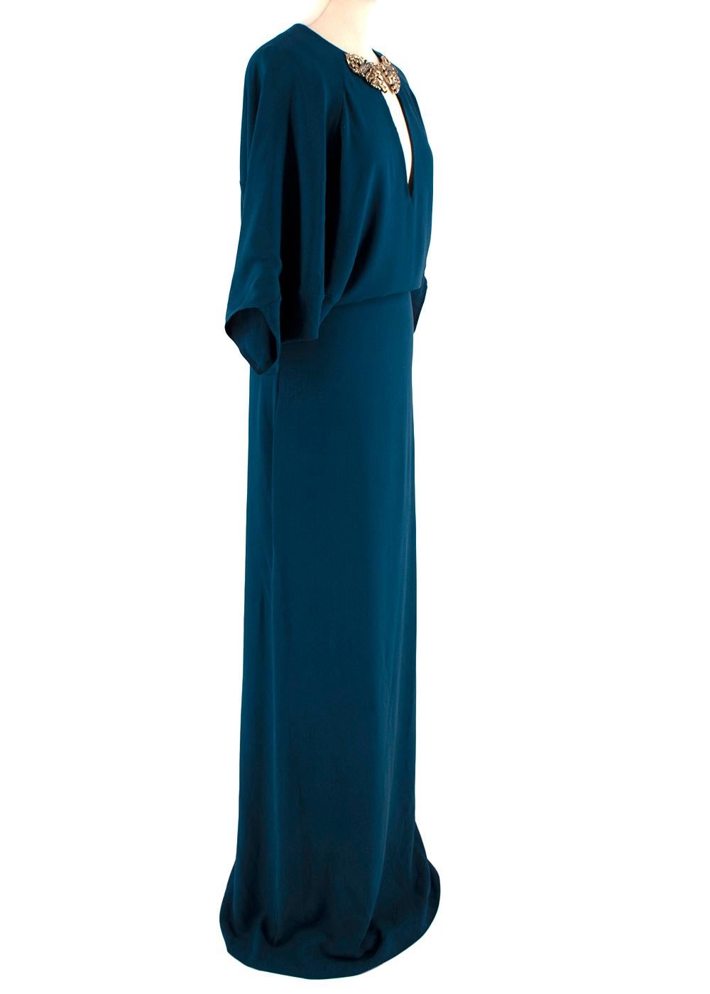 Roberto Cavalli Blue Silk Dragon Embellished Maxi Dress

- Lightweight silk 
- Cape-effect 
- Maxi length 
- Jewelled gold plated dragon neck embellishment 

Materials: 
100% Silk 

Dry Clean Only 

Made in Italy 

Shoulders - 39cm
Sleeves -