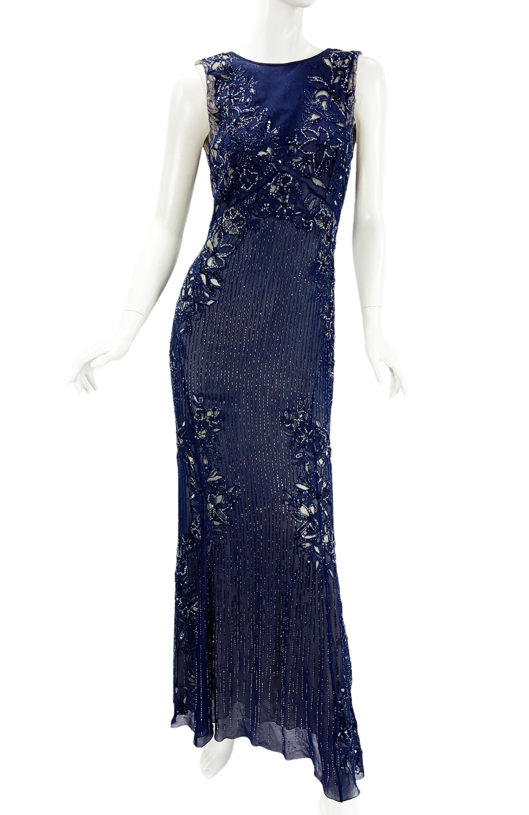 Roberto Cavalli Blue Silk Fully Embellished Dress Gown
Italian size 42 - US 6
Blue Silk Over the Tulle, Cut-Out Flower Details, Fully Embellished with Beads and Sequins, Beige Color Lining, Open Back.
Measurements: Length - 57 inches ( front) 60