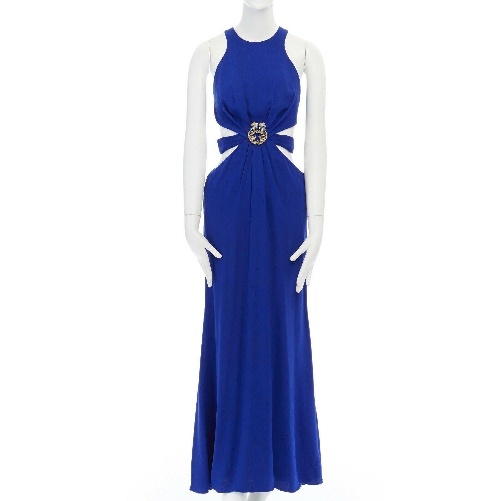ROBERTO CAVALLI blue viscose peacock enamel brooch cut out waist gown dress S 
Reference: CC/VAHI00095 
Brand: Roberto Cavalli 
Designer: Roberto Cavalli 
Material: Viscose 
Color: Blue 
Pattern: Solid 
Extra Detail: Viscose blend. Electric blue.