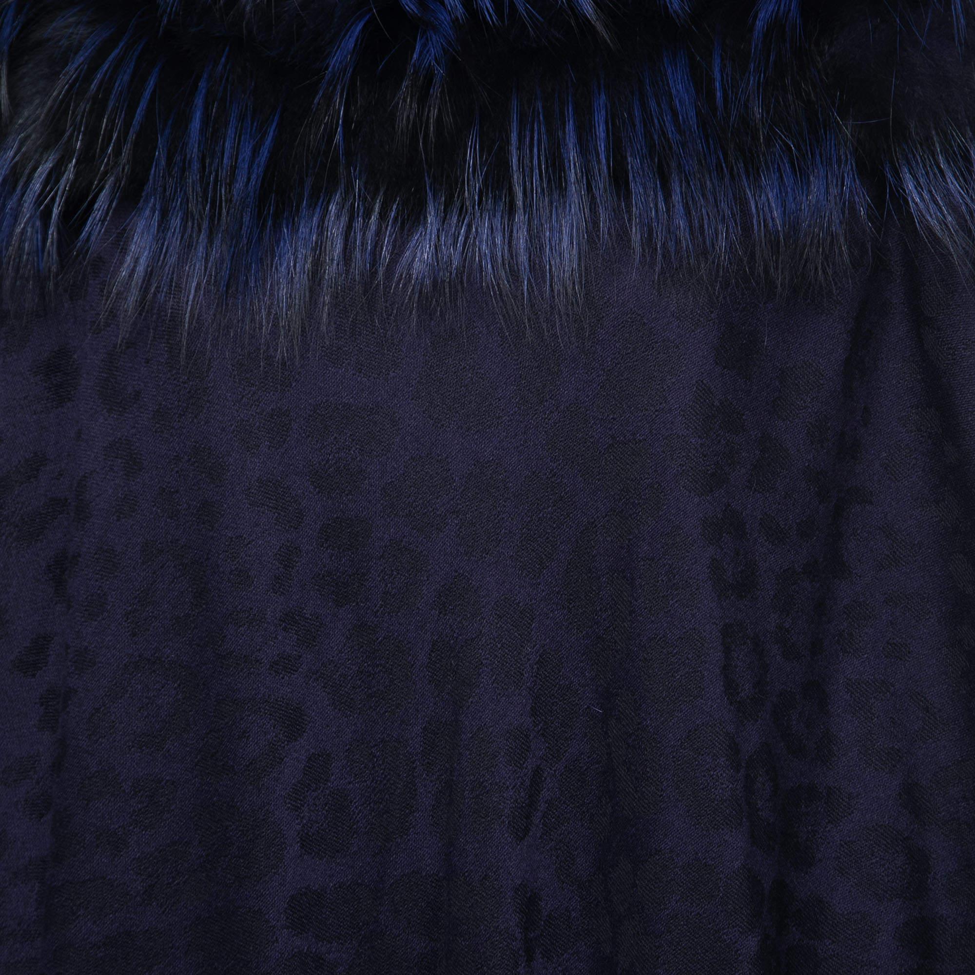 Roberto Cavalli has designed this poncho with intricate details and perfection. Give your look a luxe twist by adding this beautiful blue creation featuring a desirable silhouette. Made from a blend of wool, it has fur trims and an enveloping shape