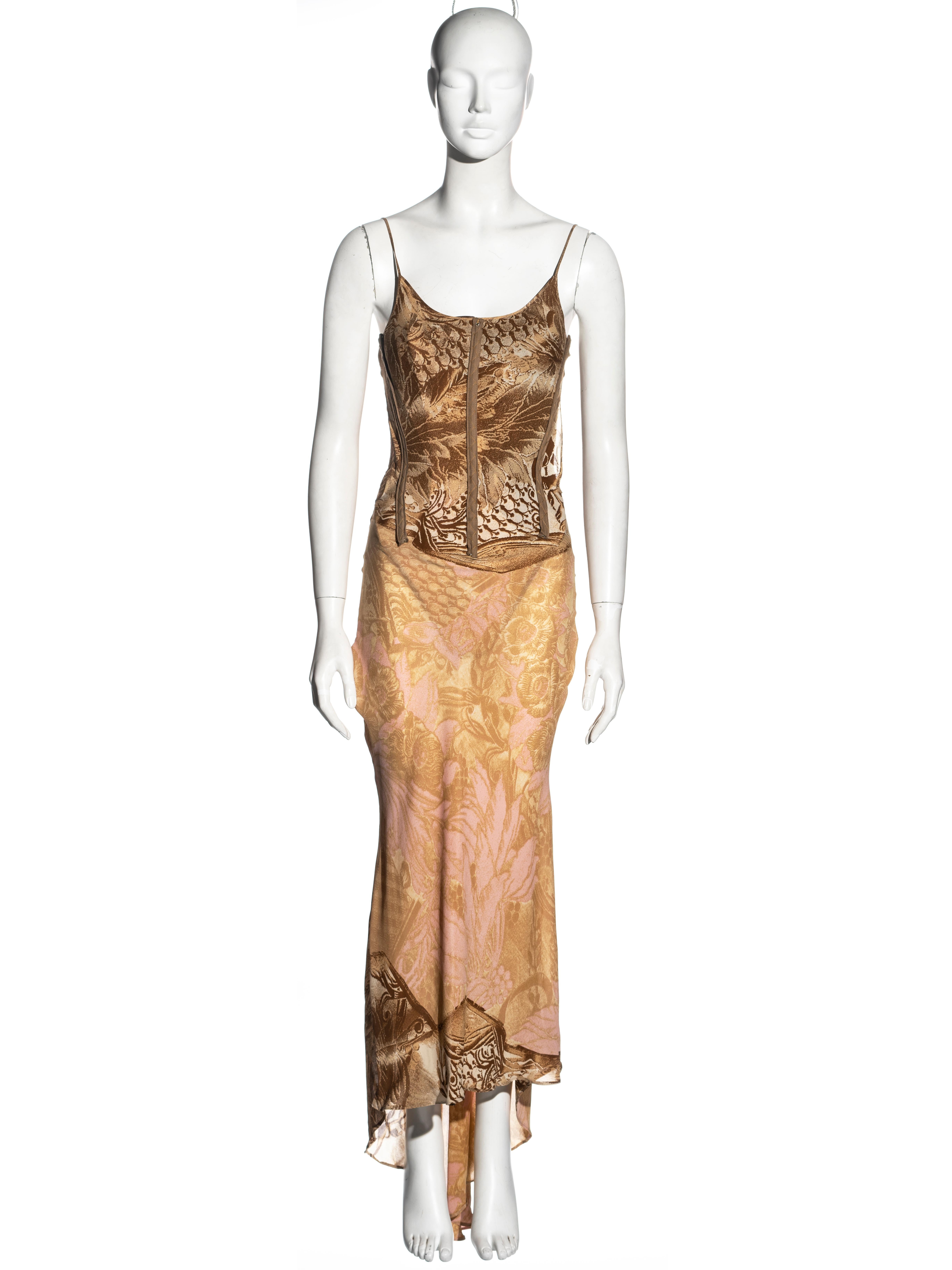 ▪ Roberto Cavalli silk evening dress
▪ Brown and pink montage print 
▪ Corseted bodice with exposed boning tape and nylon mesh overlay
▪ Built-in bodysuit 
▪ Spaghetti straps 
▪ Asymmetric hemline
▪ Size XS / S
▪ Fall-Winter 2001
▪ Made in Italy
