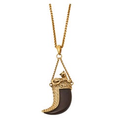 Roberto Cavalli Brown Leather Tooth Gold Tone Pendant Necklace