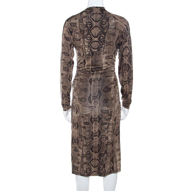 You will find excuses to wear this dress from Roberto Cavalli! The brown dress is made of a viscose blend and features a beautiful snake print pattern all over it. It flaunts a ruched detail, round neckline, and long sleeves. Pair it with stilettoes