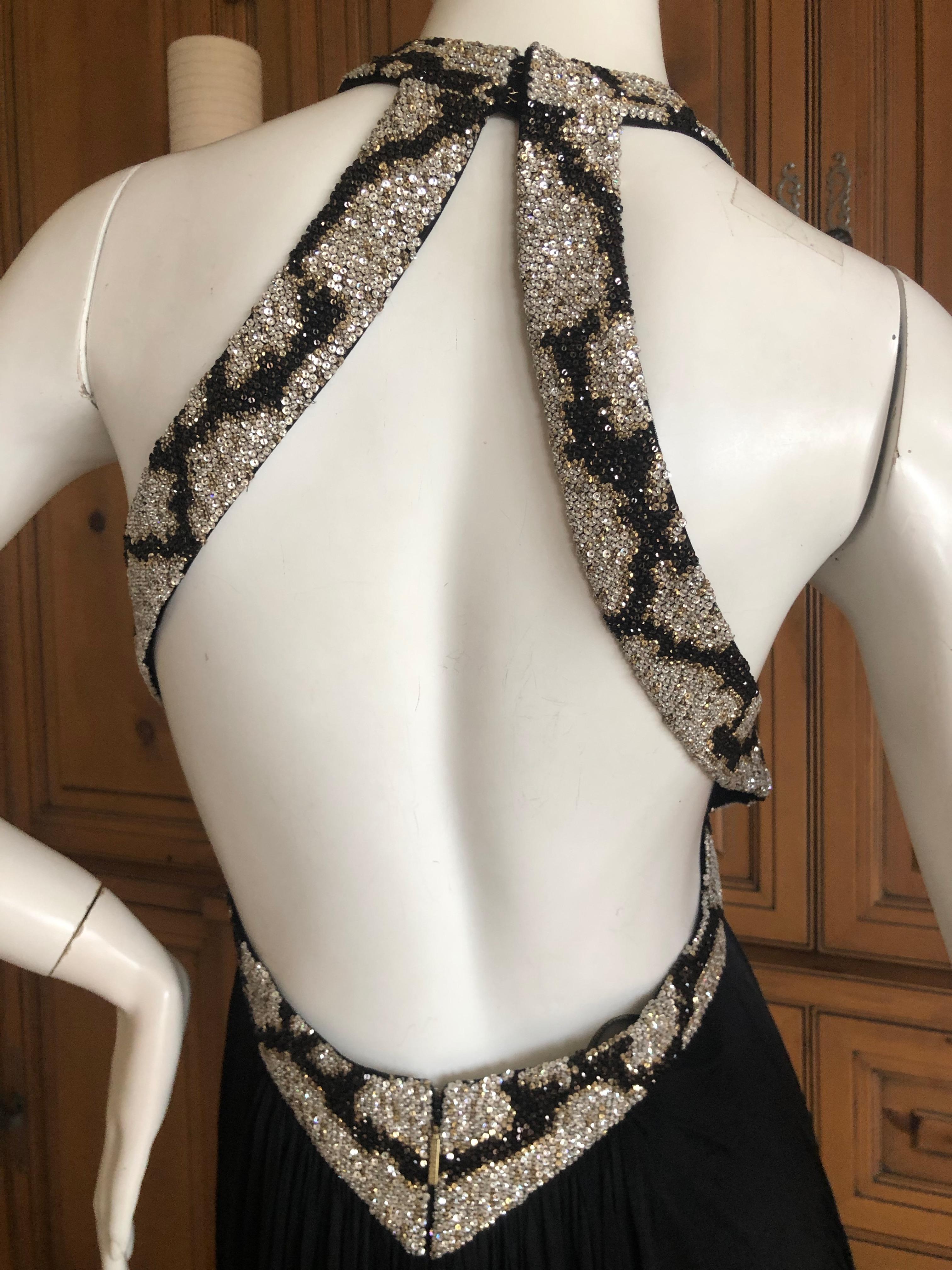 Roberto Cavalli Sexyback Black Evening Dress w Swarovski Crystal Beaded Trim by Peter Dundas.
This is so pretty, with reptile pattern in thousands of shiney Swarovski crystal beads.
Size 42
 Bust 36