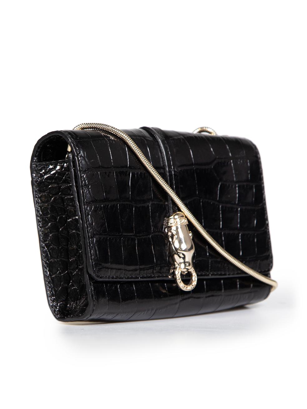 CONDITION is Very good. Minimal wear to bag is evident. Missing embellishment on the hardware at the front and tarnishing to the hardware at the back on this used cavalli class designer resale item. The item comes with a dust bag.
 
 
 
 Details
 
