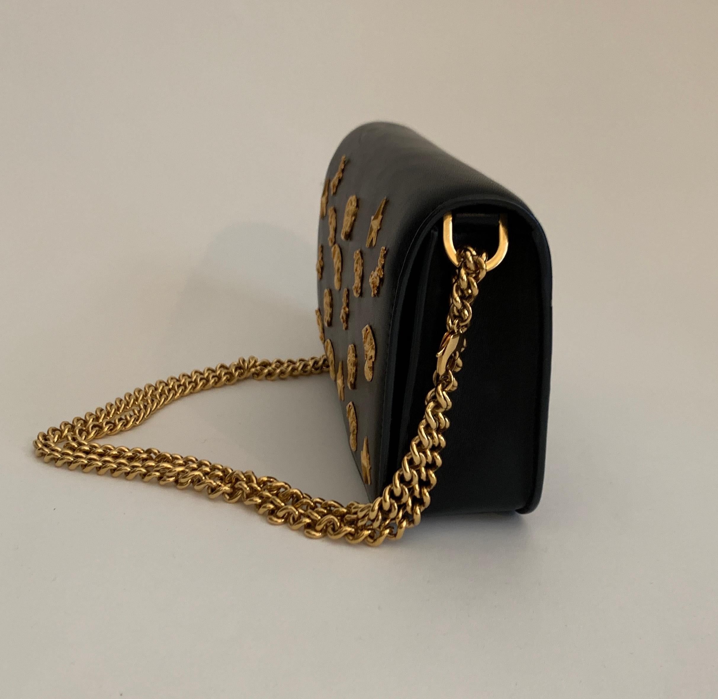 gold and black purse