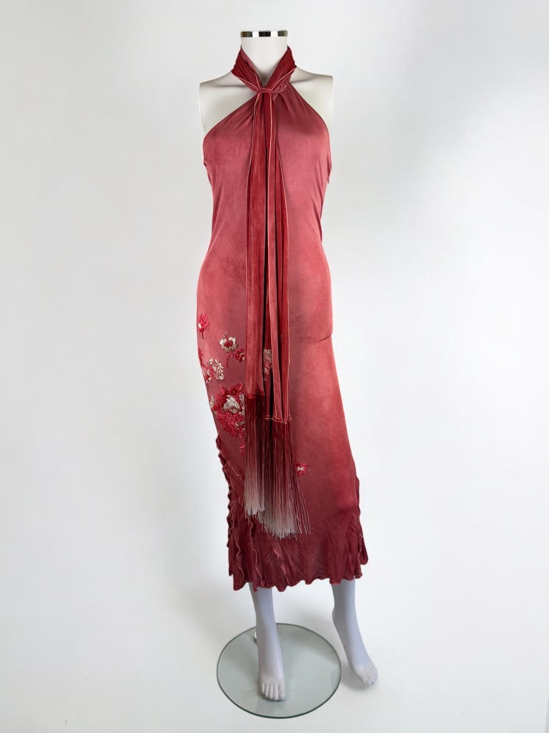 Class Cavalli salmon pink halter dress, early 2000s
Floral embroidery cascading down one side of skirt, and frill detailing towards the hem 
Comes with matching fringed scarf which can be worn in several ways for dramatic effect
Side zip
100%