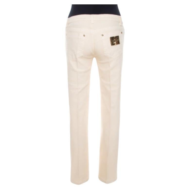 Realizzati in Italia, questi jeans di Roberto Cavalli sono un'aggiunta perfetta alla tua collezione di jeans. Questi jeans hanno una bellissima tonalità crema e un effetto stropicciato. Realizzate in misto cotone, sfoggiano il logo del marchio sulla