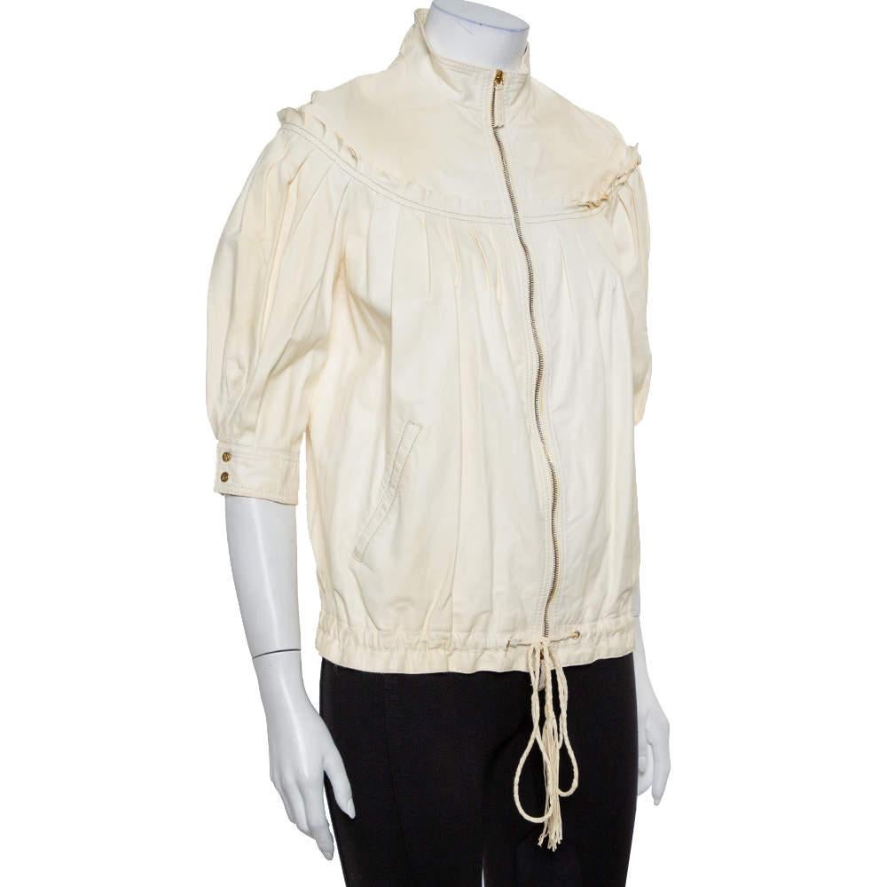 This jacket has been designed by Roberto Cavalli to accompany you all day long. Made from leather and lined with silk, the cream jacket promises comfort and effortless fashion. It features a front zip closure, two pockets, mid sleeves, and pleat