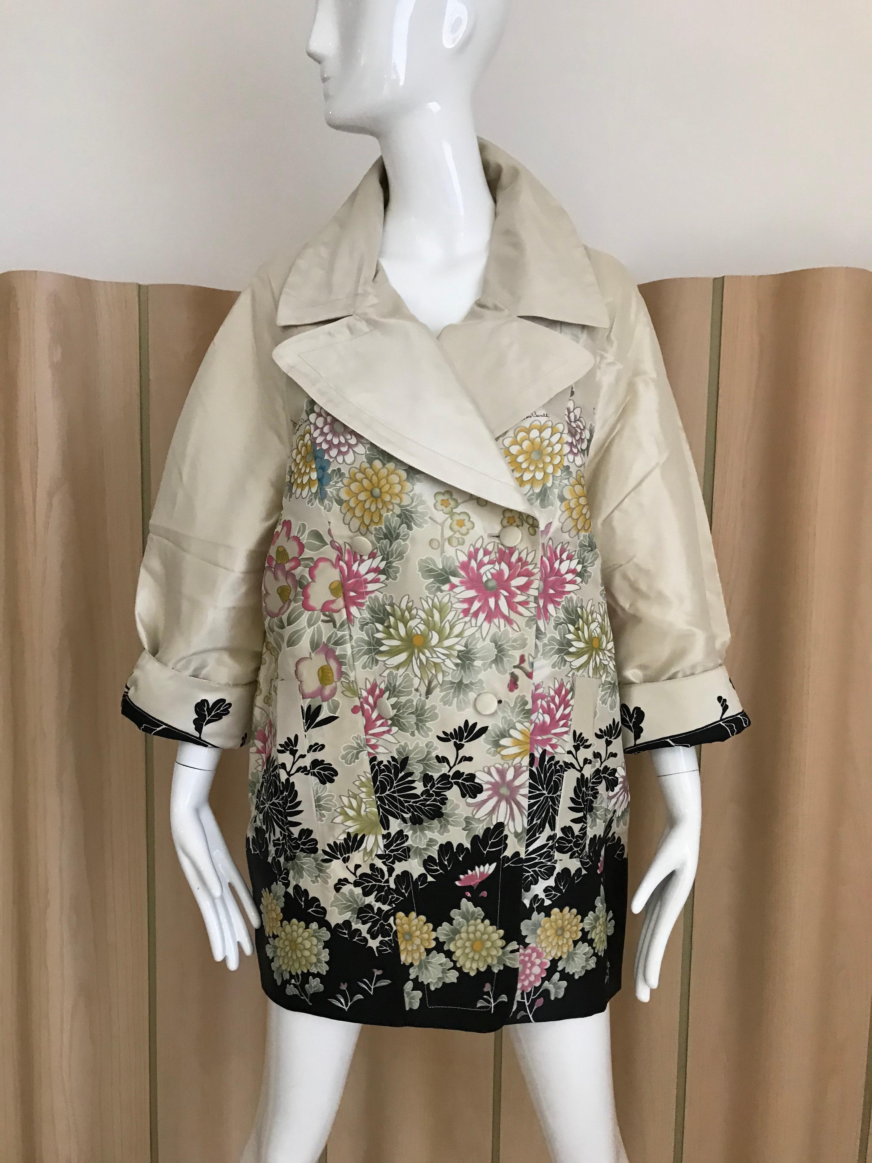 Roberto Cavalli Silk Creme coat with multi color floral prin in pink, green, Creme and yellow. Coat is brand new with Tag ($4760)
Size: 38italy 
Coat Length: 34