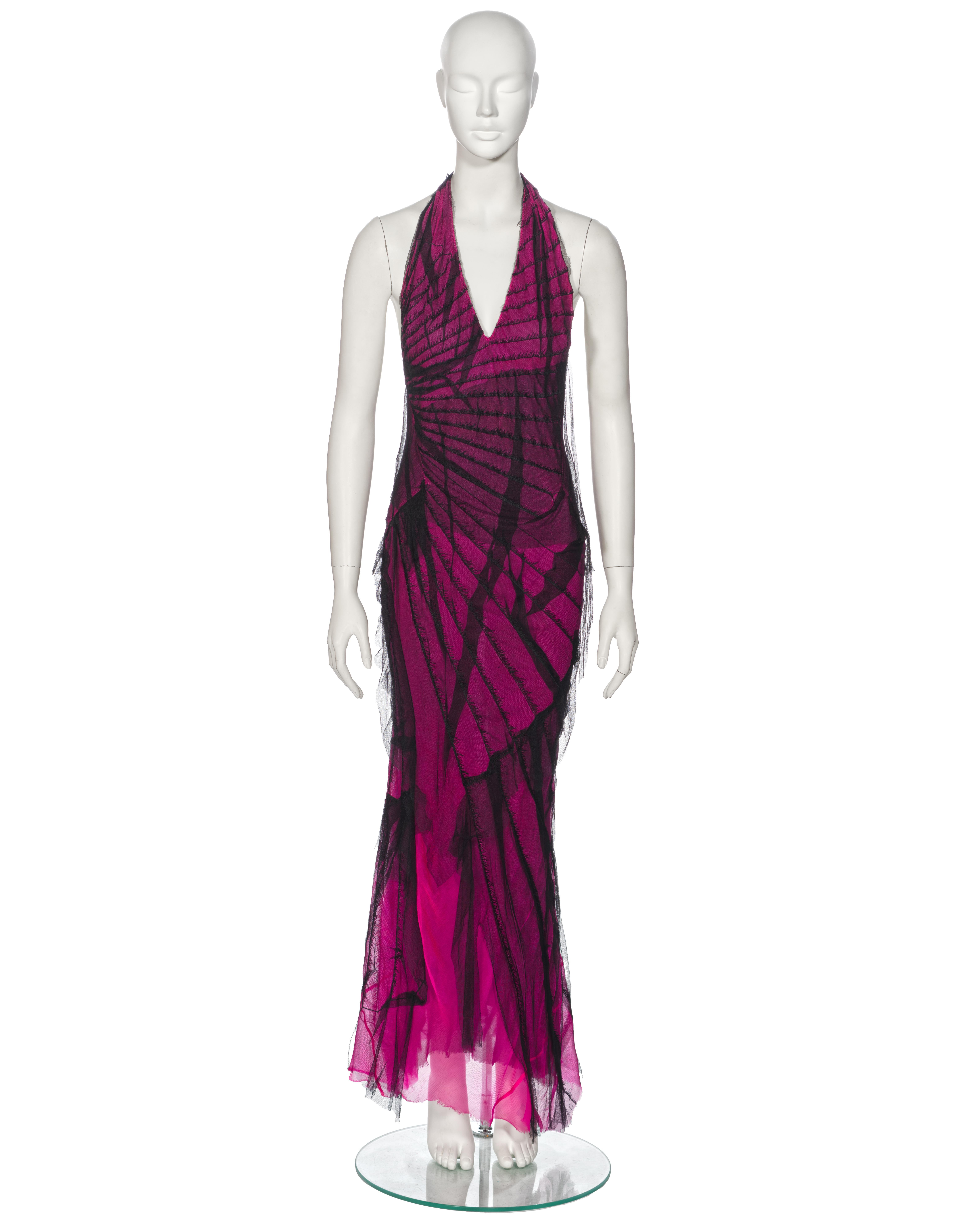 ▪ Archival Roberto Cavalli Evening Dress
▪ Spring-Summer 2001
▪ Sold by One of a Kind Archive
▪ Crafted from pink silk chiffon
▪ Enveloped in a distressed black silk mesh overlay, featuring layered paneling and frayed edging
▪ Designed with a
