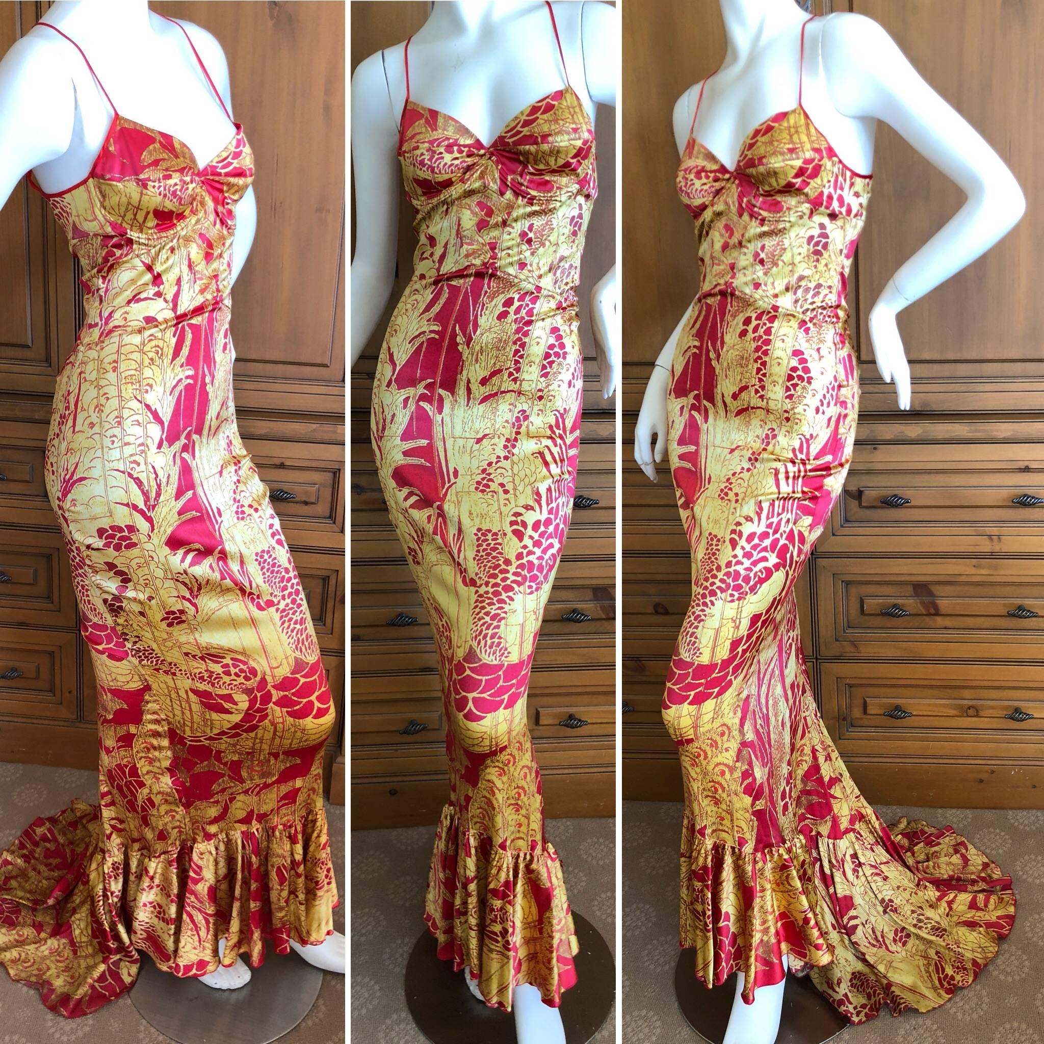 Roberto Cavalli Elegant Fishtail Mermaid Back Evening Dress.
The print is a stylized blow up of Aubrey Beardsley's famous Salome Peacock
 This is so pretty, with a rich gold print, and mermaid fishtail back.
 Size 40, but runs small. Bust 36