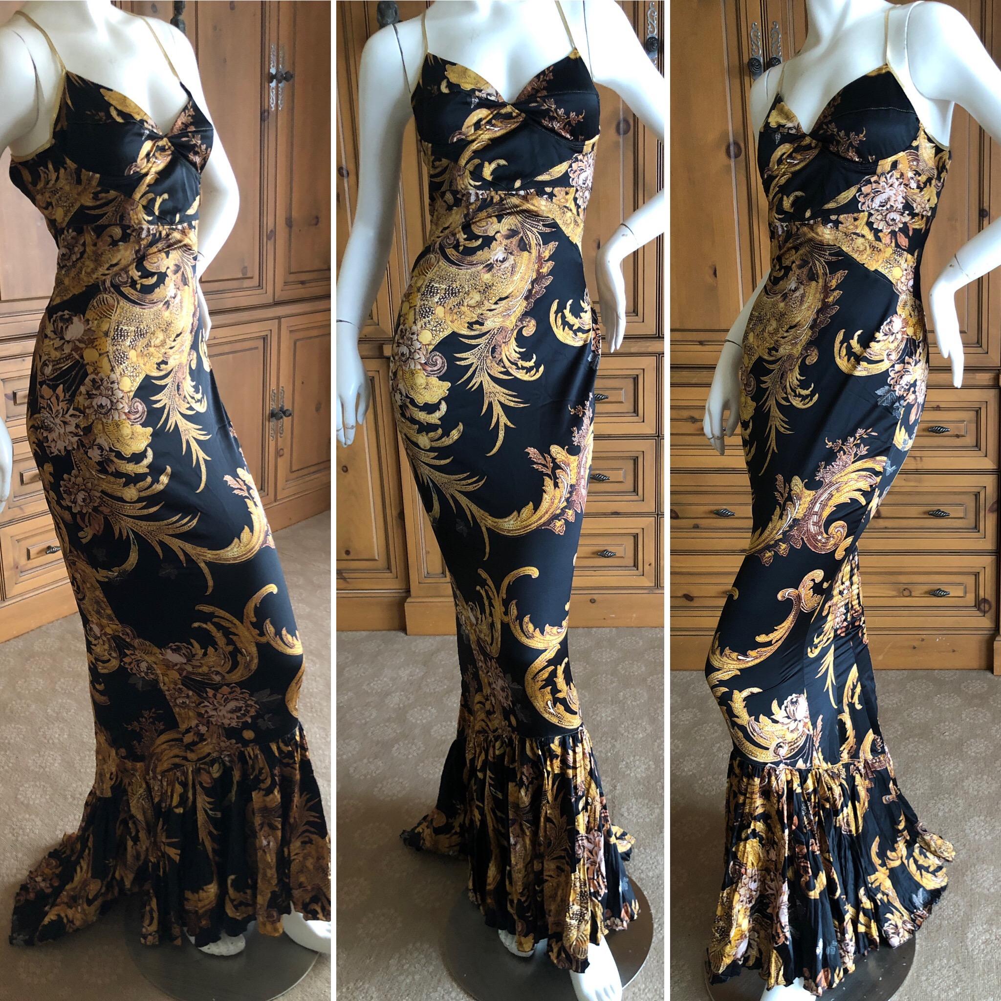 Roberto Cavalli Elegant Fishtail Mermaid Back Evening Dress.
This is so pretty, with a rich gold print, and mermaid fishtail back.
Size 42, but runs  small
Bust 34
