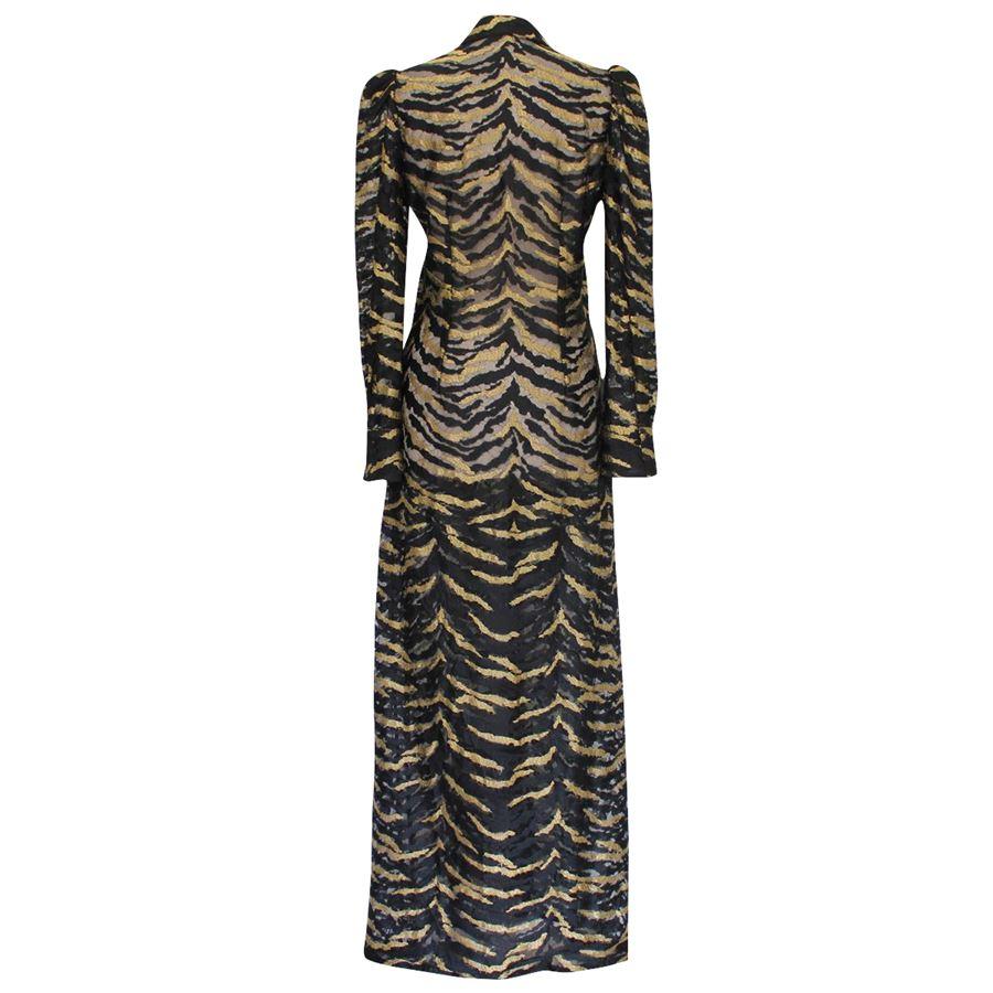 Fantastic Roberto Cavalli dress
Black color
Golden lamè details
Transparent lace
Buttons closure
Long sleeves
Total length cm 142 (55.9 inches)
Shoulder cm 32 (12.5 inches)
Missing coposition tag
Worldwide express shipping included in the price !