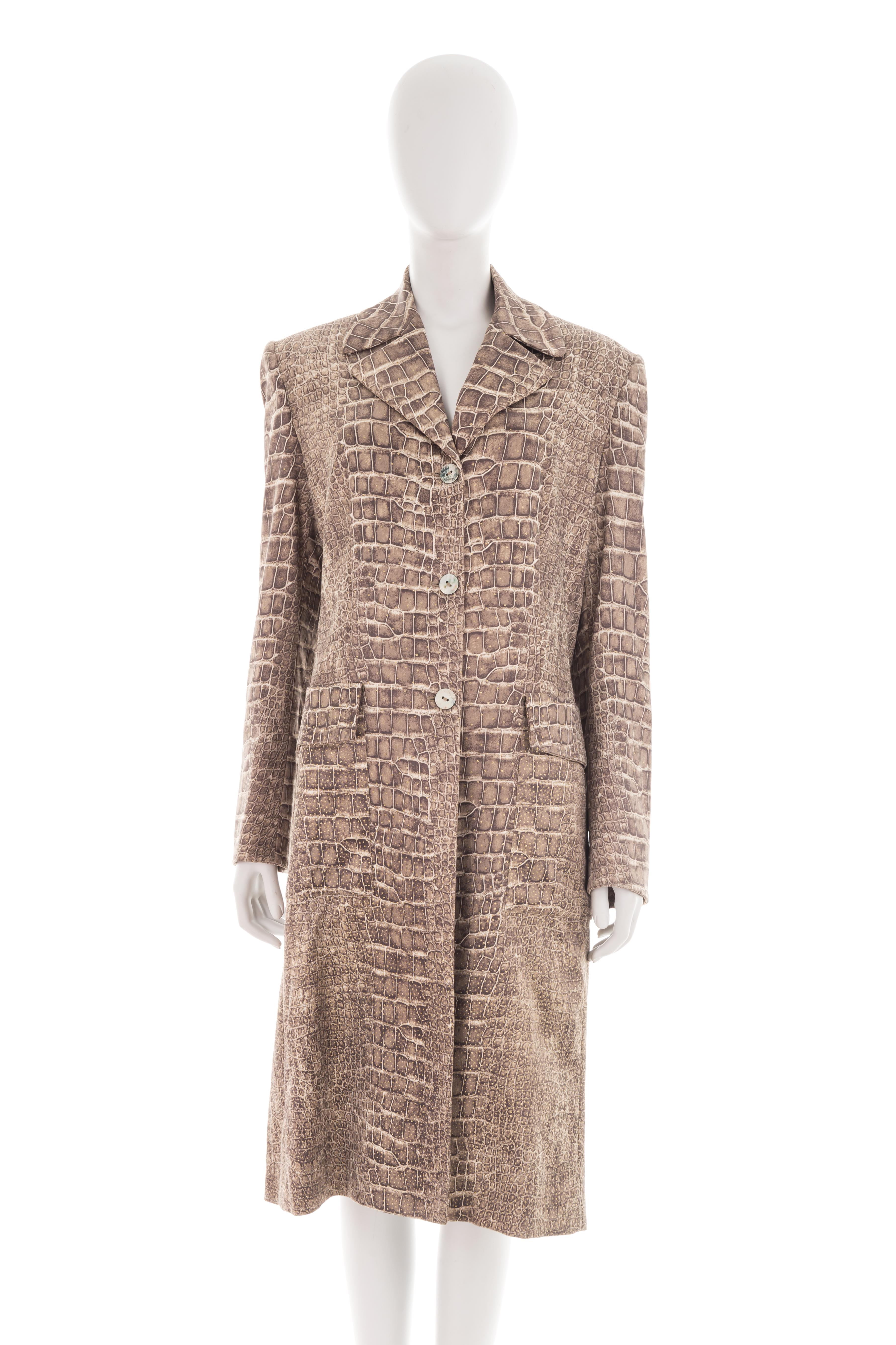 - Fall-winter 1998 collection
- Sold by Gold Palms Vintage
- Brown croc print with golden spots allover 
- Silk trench coat
- Large notch lapels and collar
- Mother of pearl front buttons
- Front pockets
- Additional belt
- Size: M
