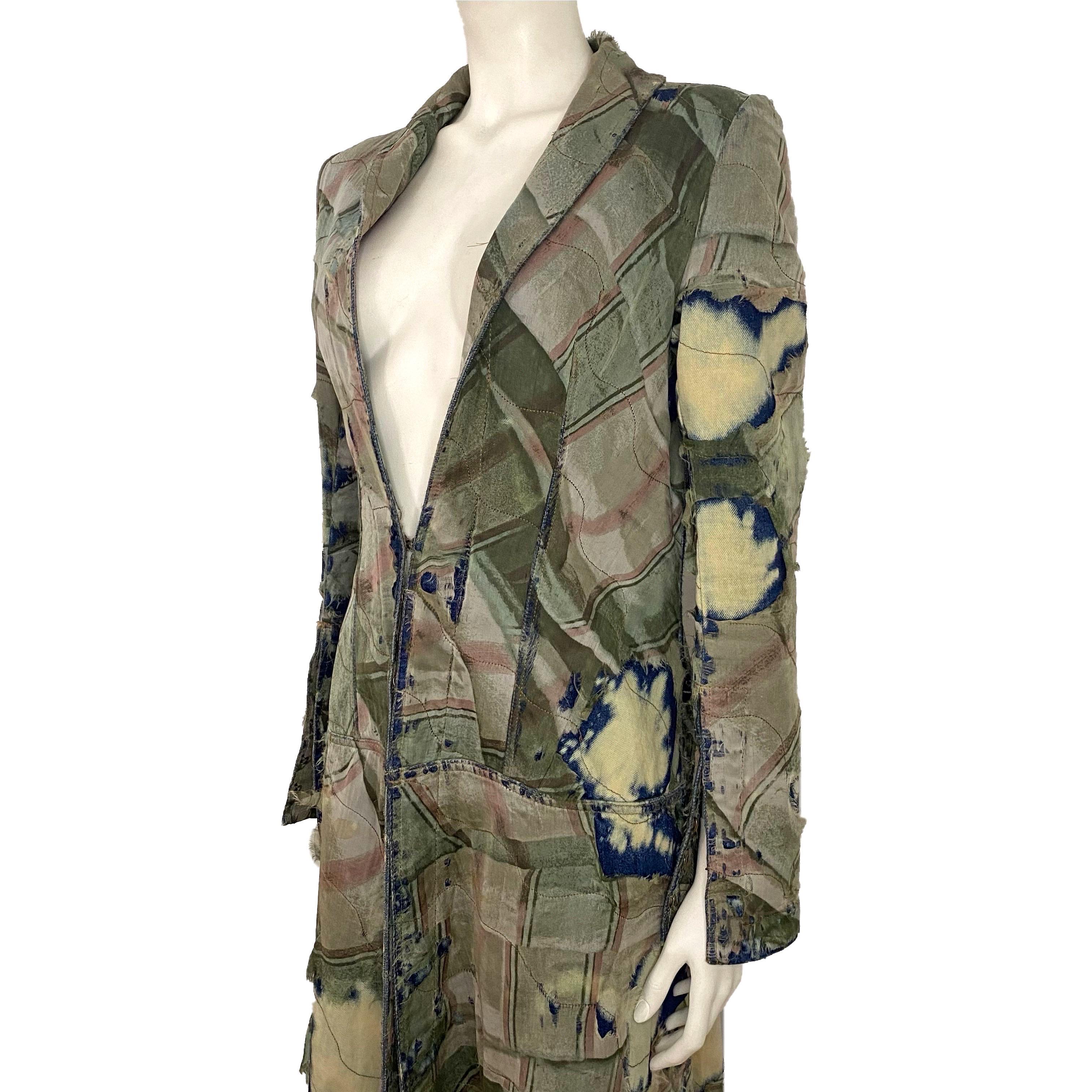 Roberto Cavalli long bleached denim coat with distressed green silk outer layer from the Fall/Winter 2001 collection (seen on both campaign and runway show). Corset structured, front hook closure, open sleeves (with hooks).

Size M

Shoulder to